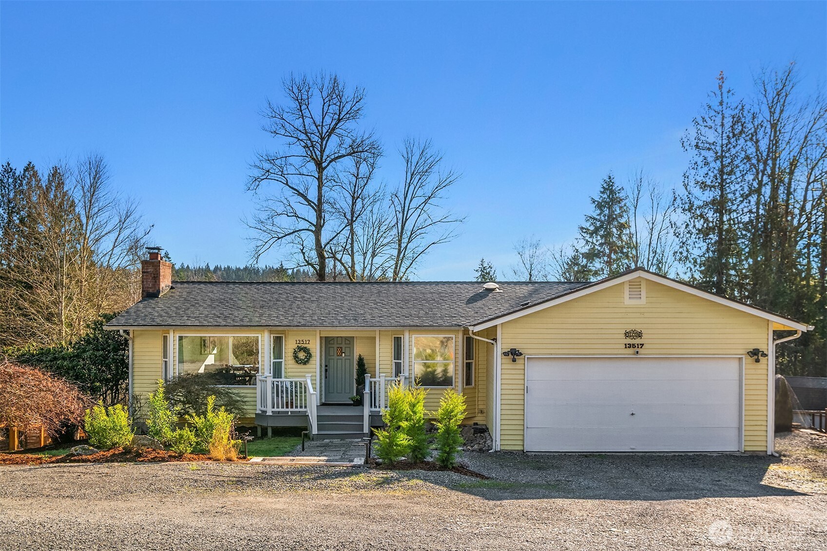 View from the living room towards the sunny dining area with view windows.
