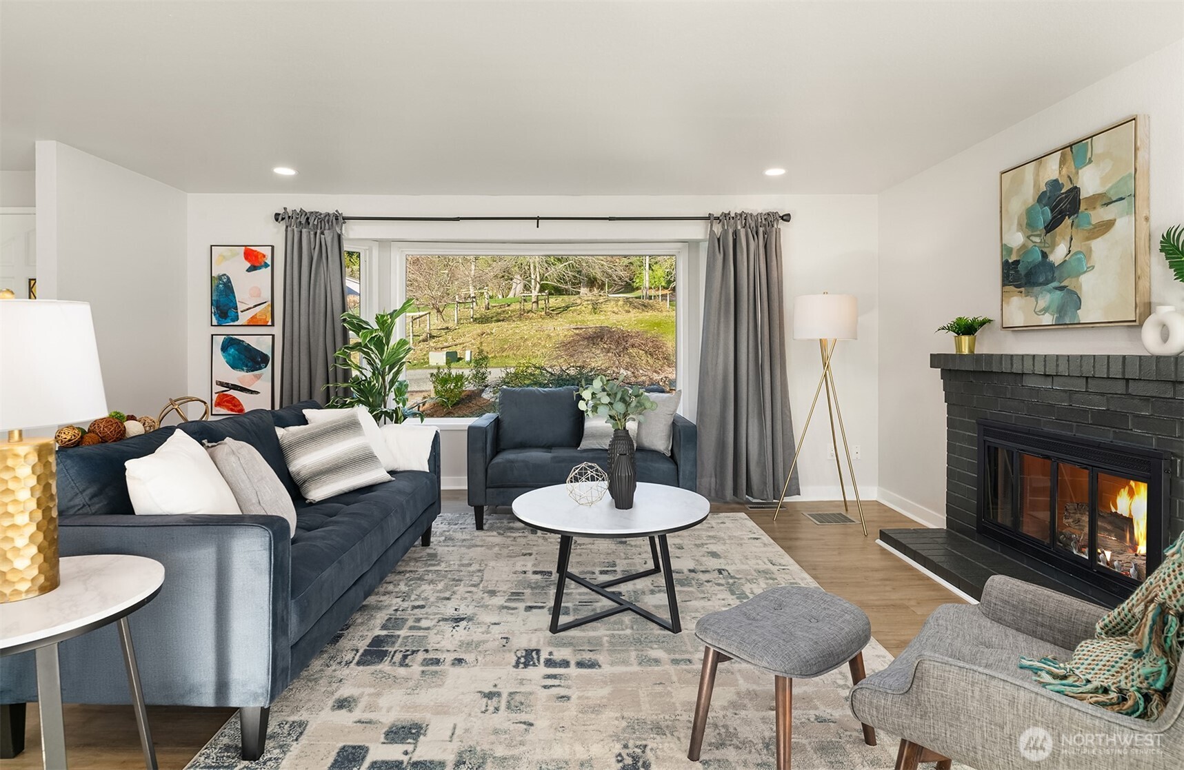 Spacious dining room is bathed in sunlight. New, high quality shades have been installed on all south-facing windows.