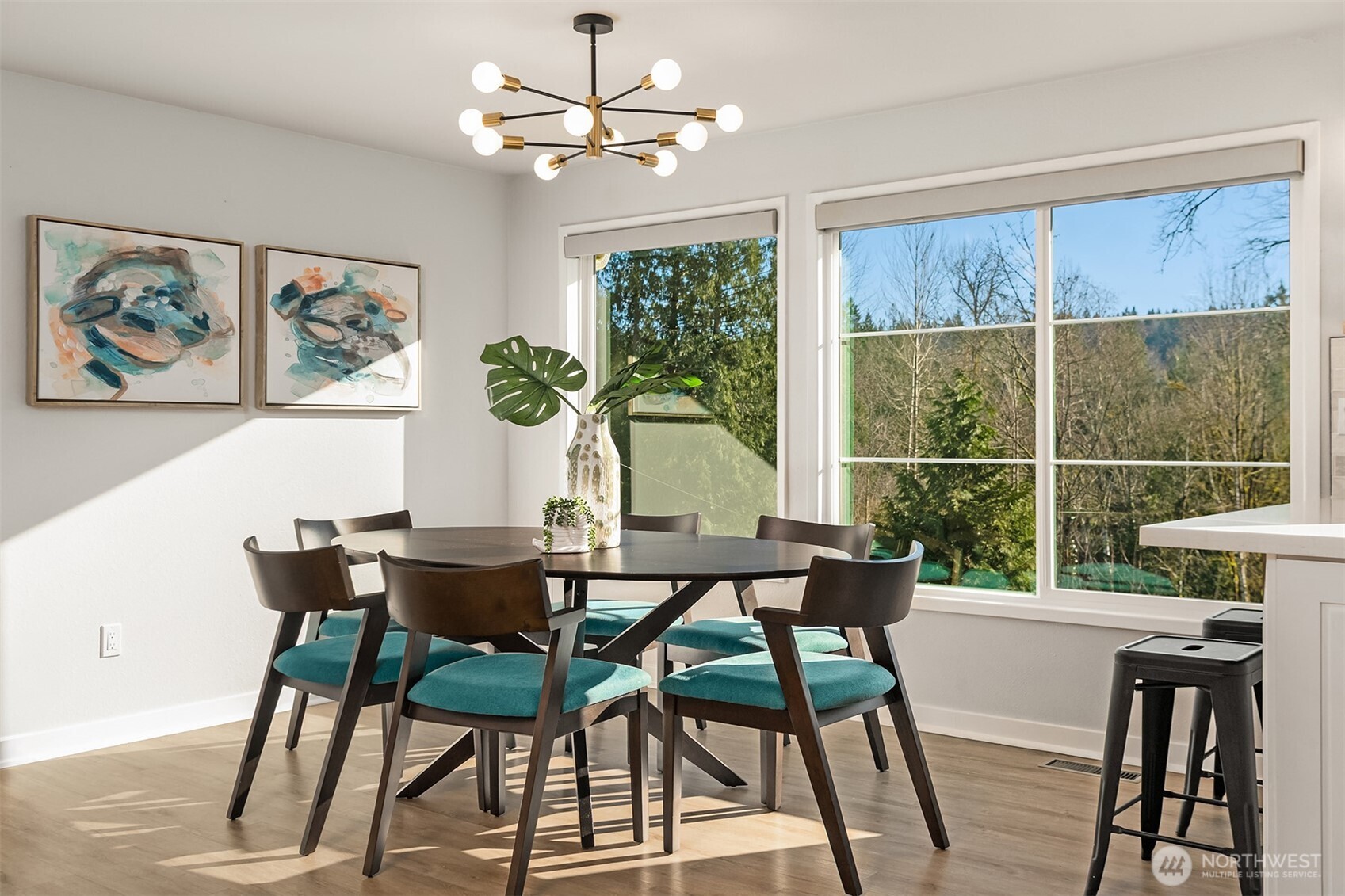 Roomy remodeled kitchen with ample cabinets, stainless steel appliances, and a high-end water filtration system.