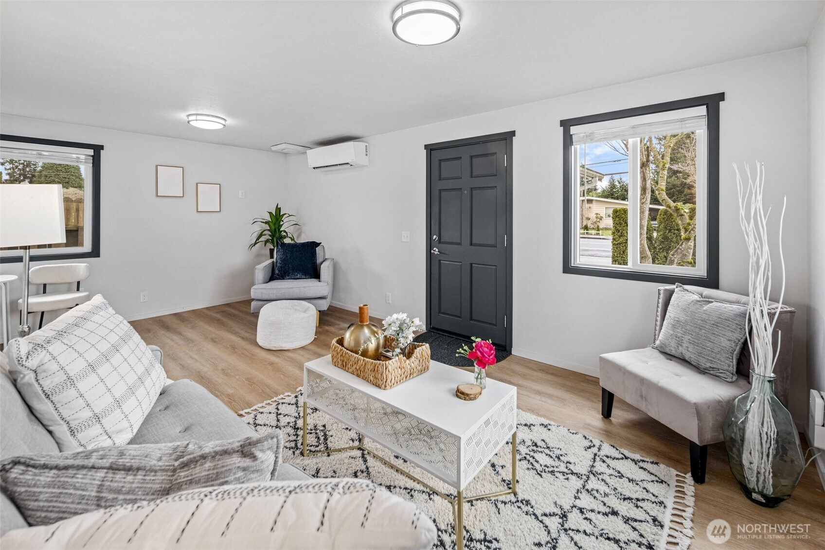 An open floor plan flows into the fully refreshed kitchen with dining space.