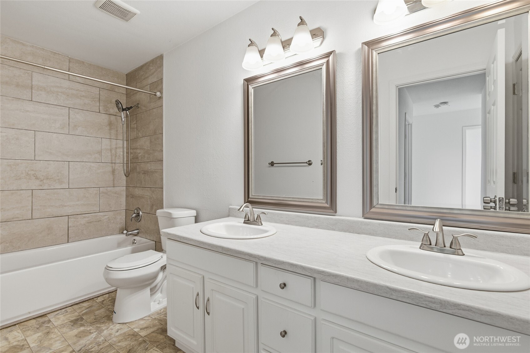 Upstairs jack-and-jill bathroom in main house.