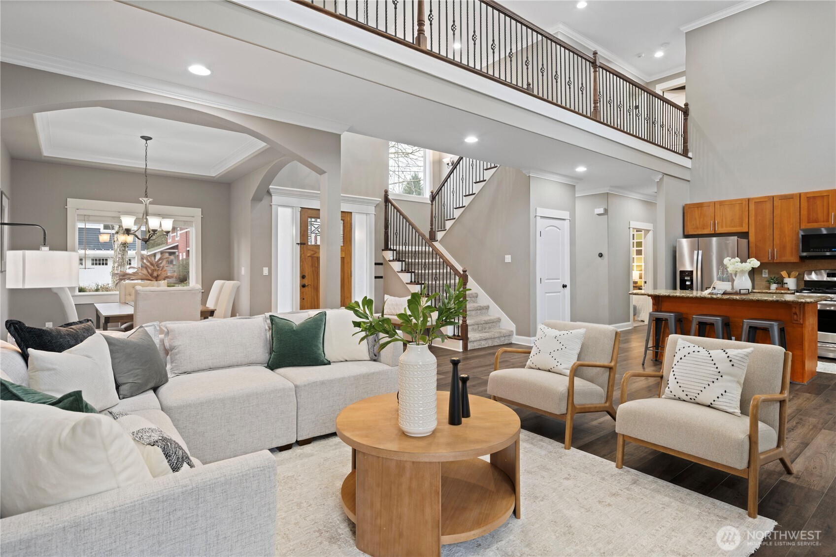 Main level floor with primary suite, 2 additional bedrooms & bath.  Open greatroom with 2-story ceiling brings maximum daylight.