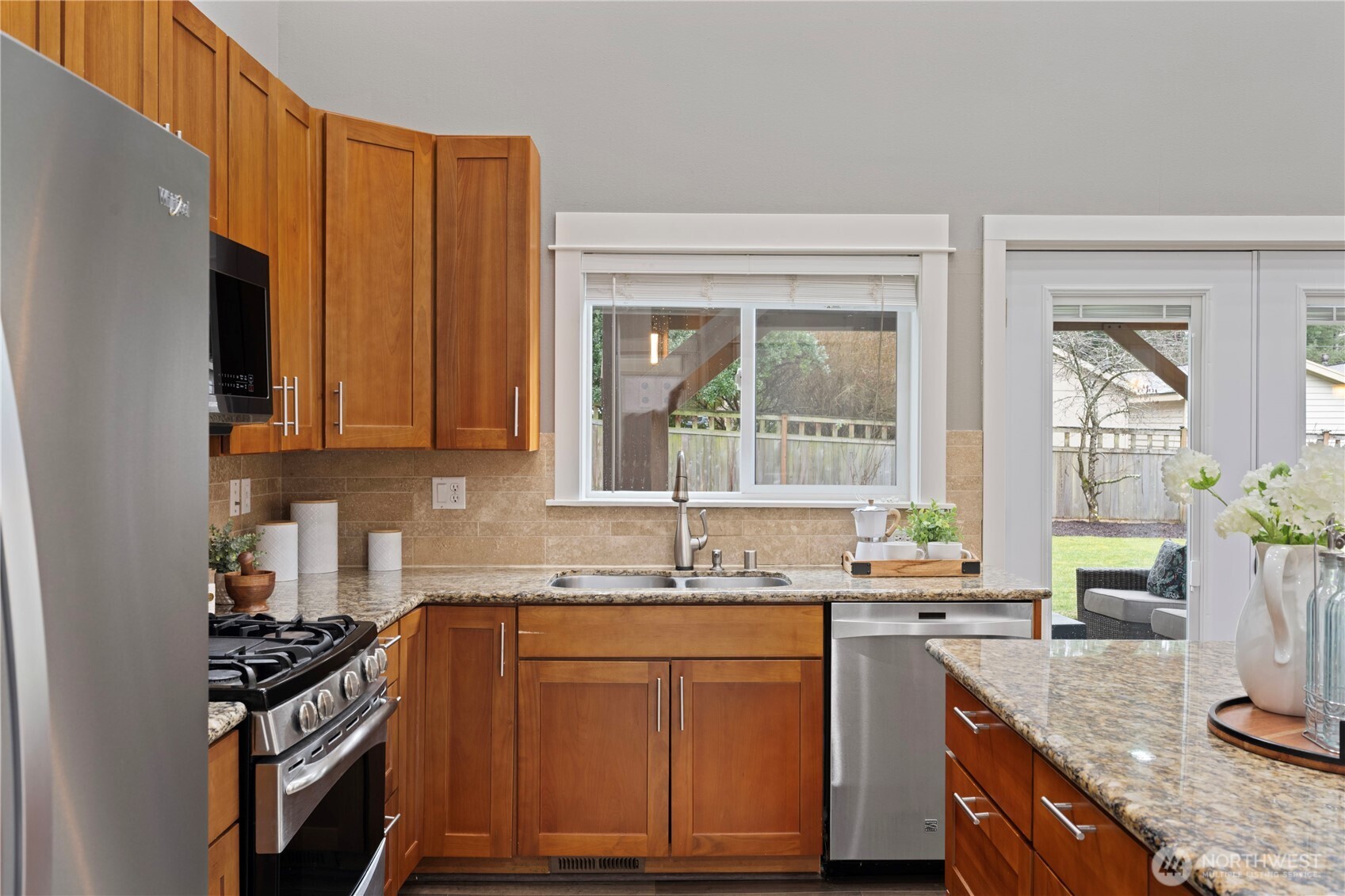 Ideal Rose Hill location 5 BR, 3.25 BA, Main Floor Primary on a large level backyard.