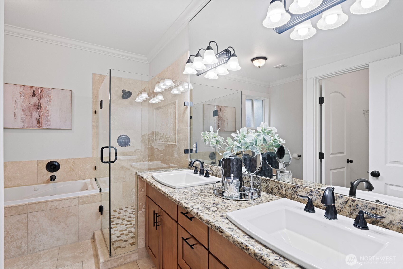 Comfortable great room with dining room in the back.  Door leads to the large laundry room and to the garage.