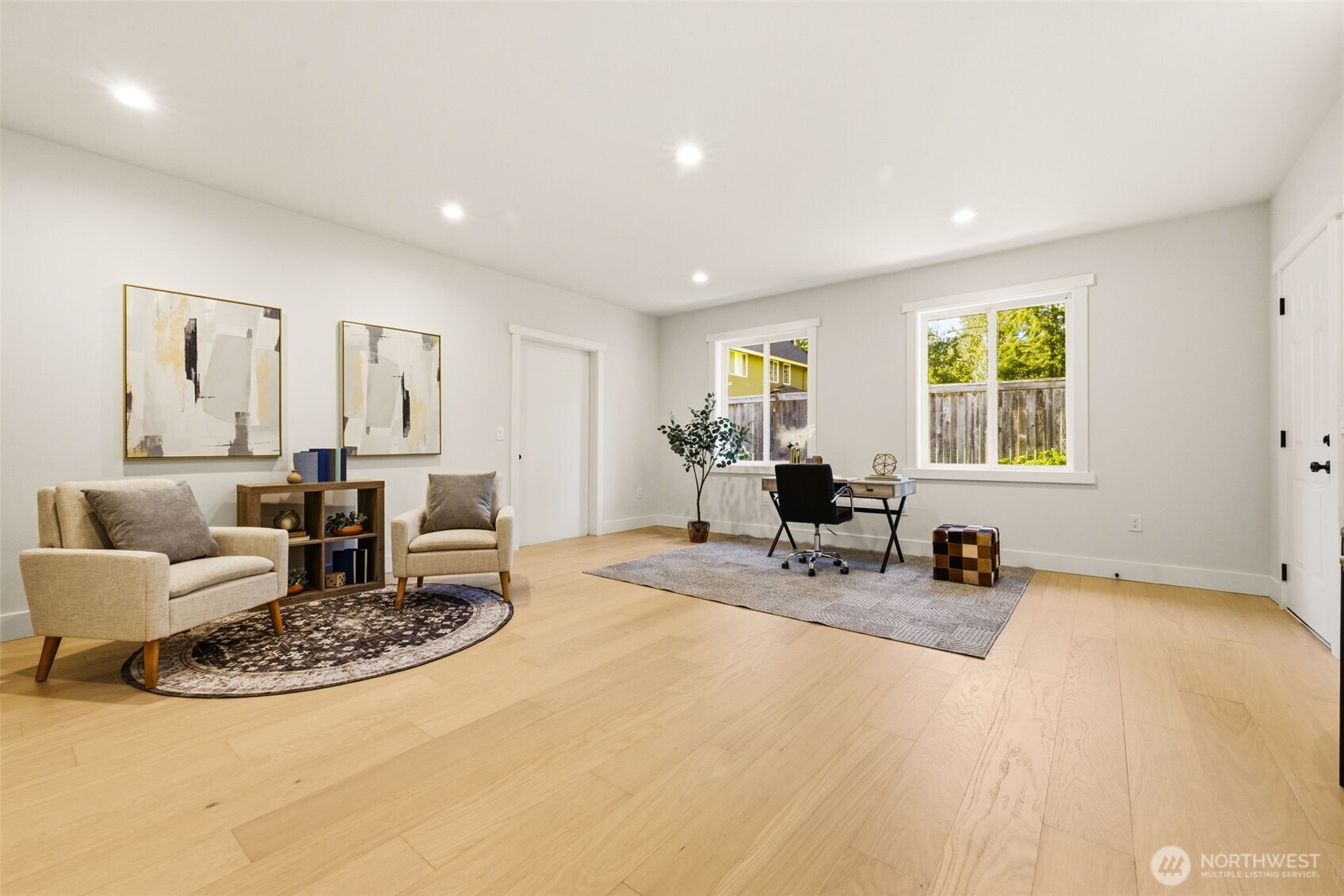 Office with a private outdoor entrance and passage to garage as well.