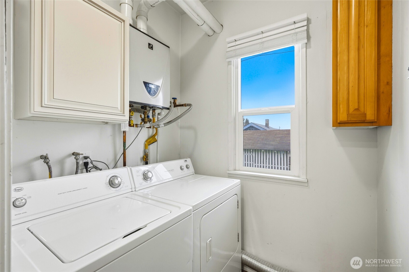 Laundry room and tankless hot water heater