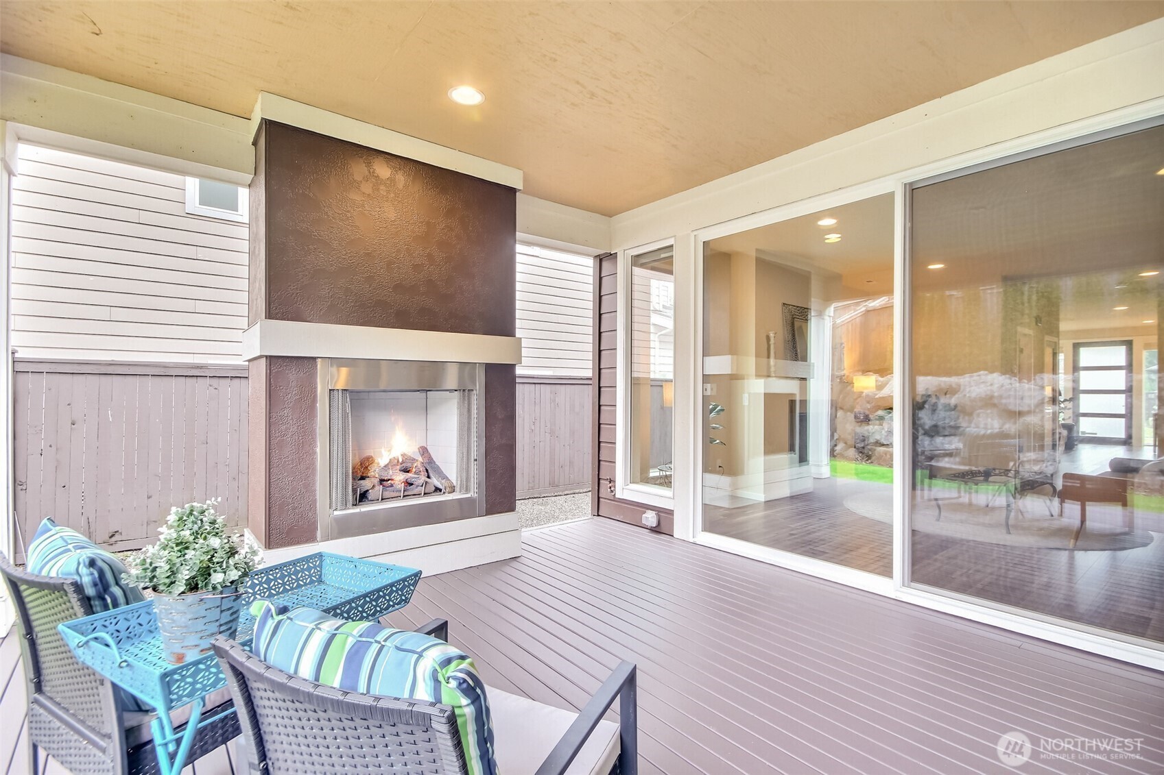 Deck to Large slider from the Dining room and there one more large slider to Great room