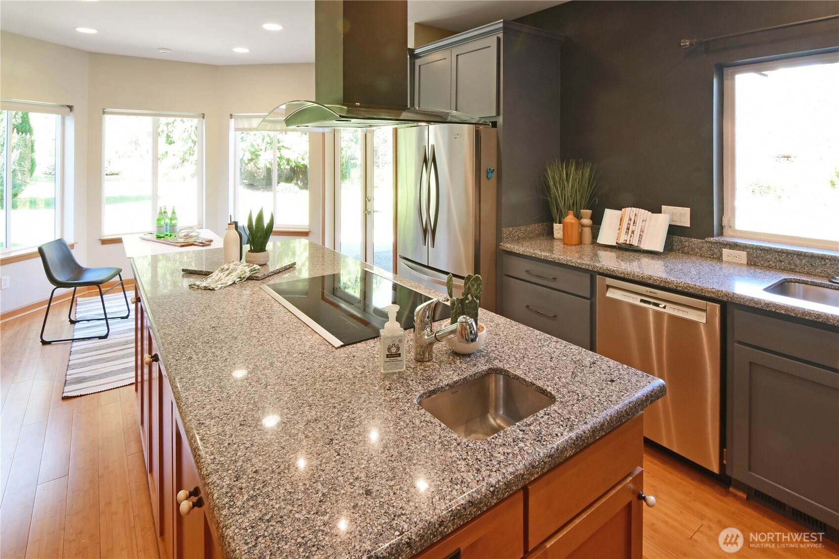 Stylish dining area with designer lighting and seamless connection to the kitchen for easy entertaining.