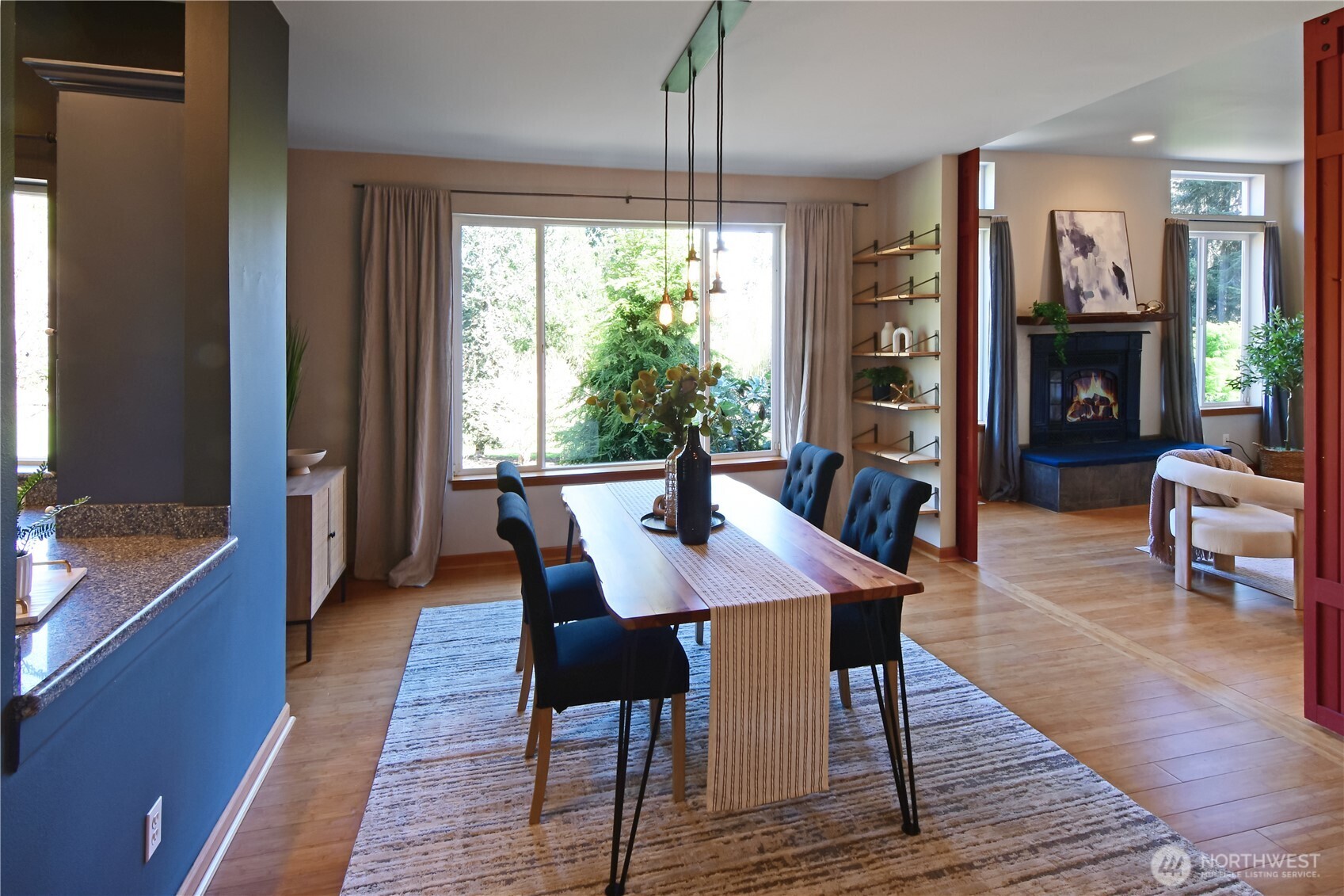 Dining link to the kitchen. Note the large windows letting in so much natural light.