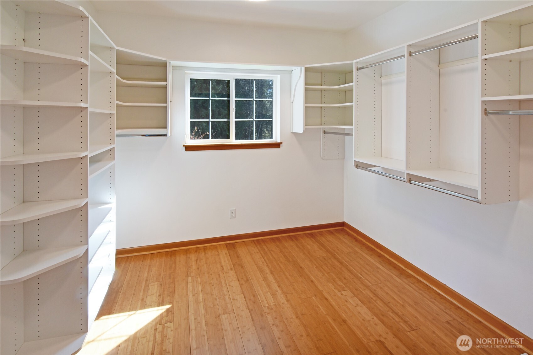 Inviting primary bath featuring heated floors, thoughtful design, and comfortable single-level accessibility.