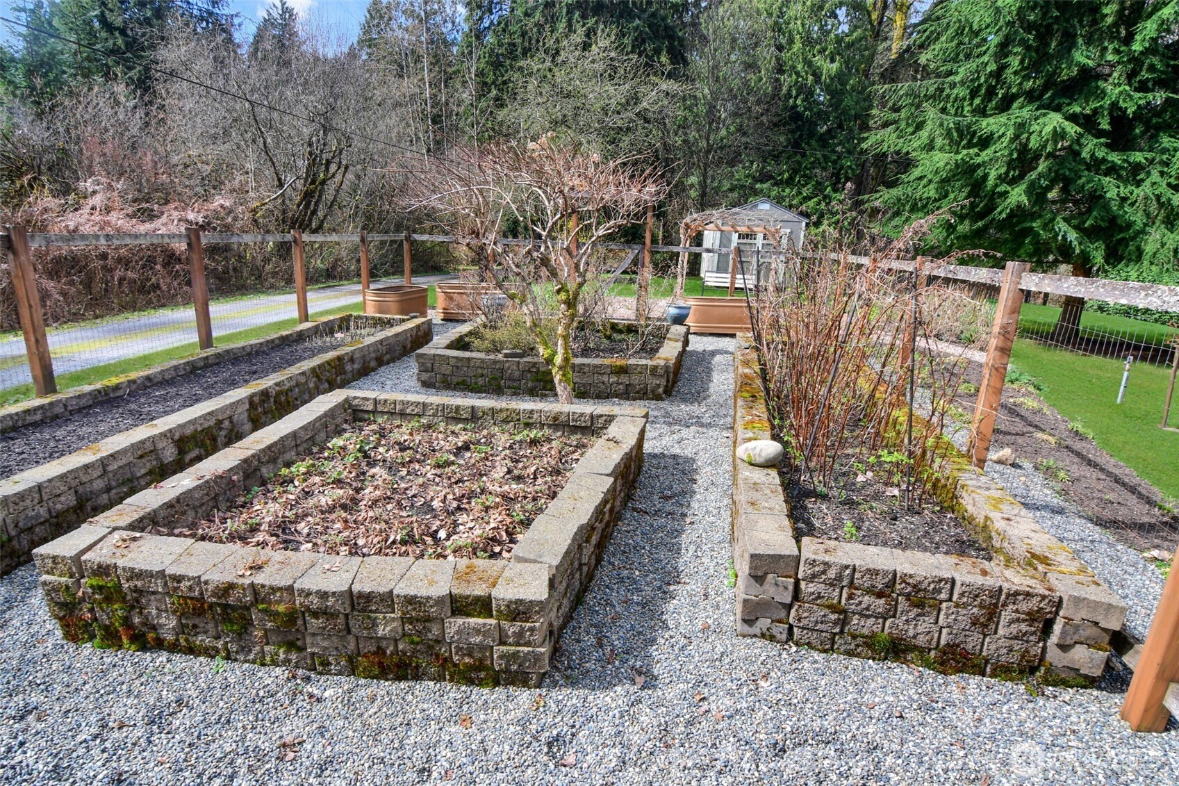 Enjoy this private level property. Most is landscaped with a small area natural woods. Come visit to appreciate this property.