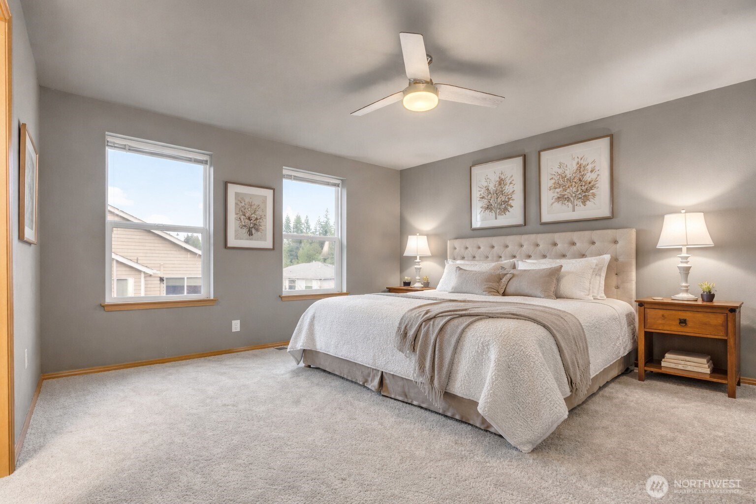 Primary bedroom has two walk-in closets (one not pictured)