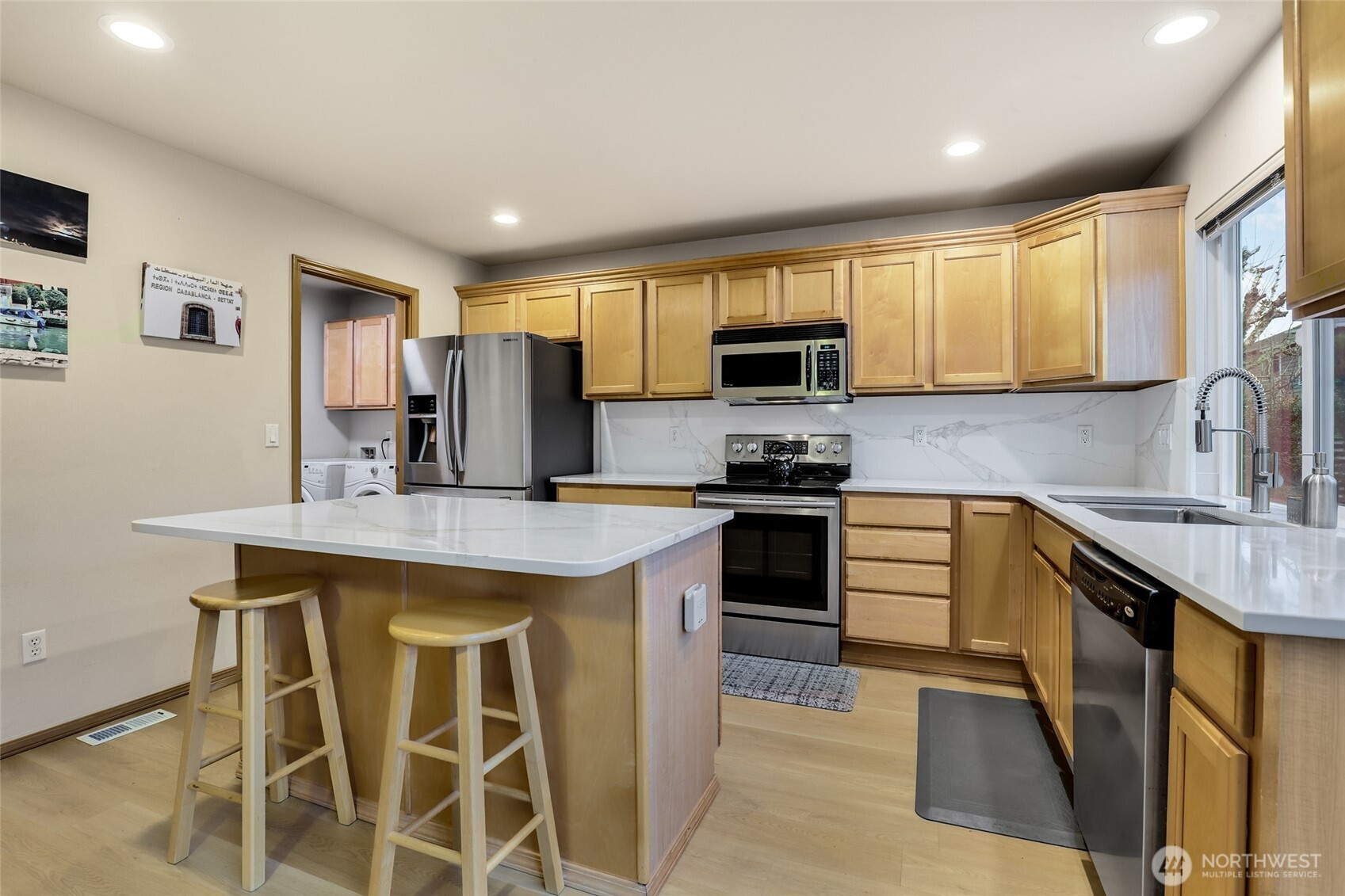 Access to garage through the mud/laundry room
