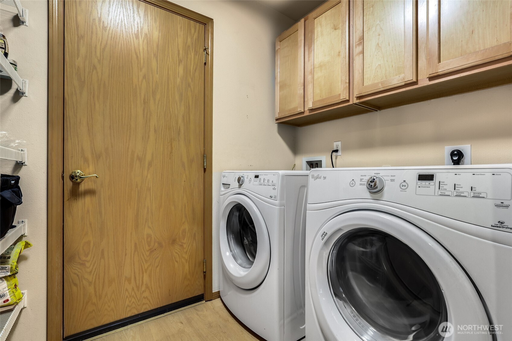 Laundry and/or mud room connects kitchen to garage for easy living