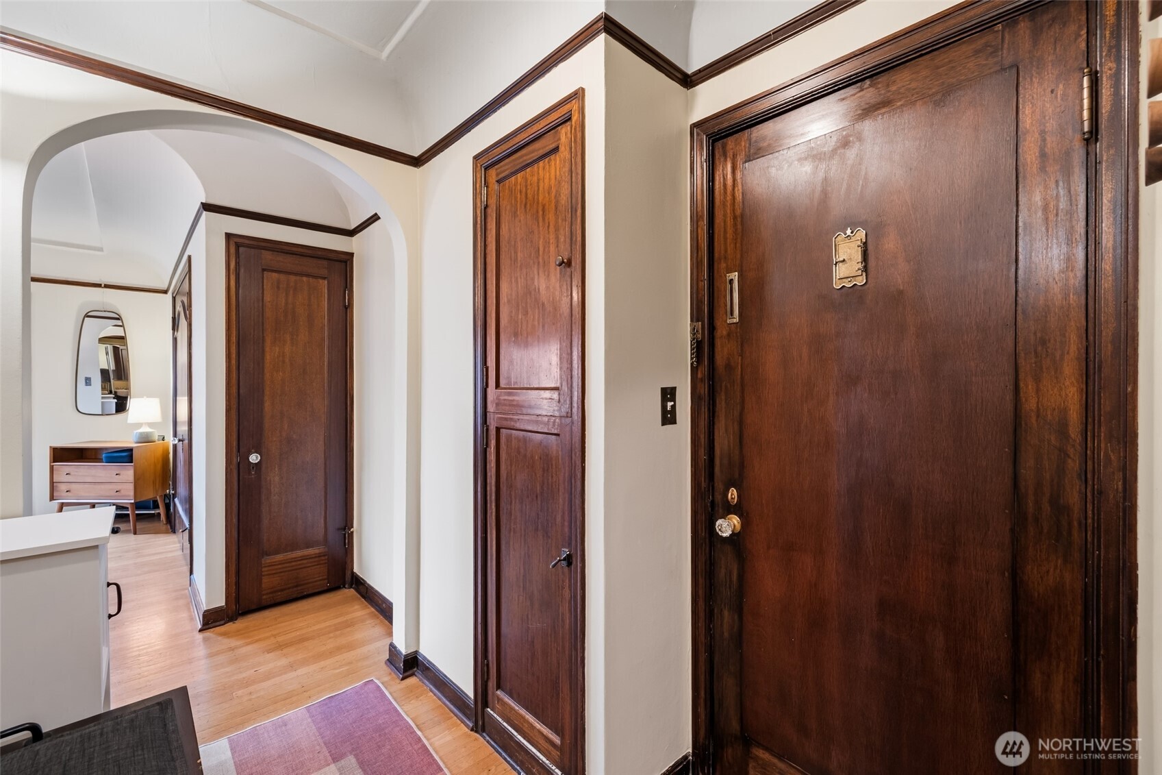 Wood doors, trim, never painted maintaining that original charm.