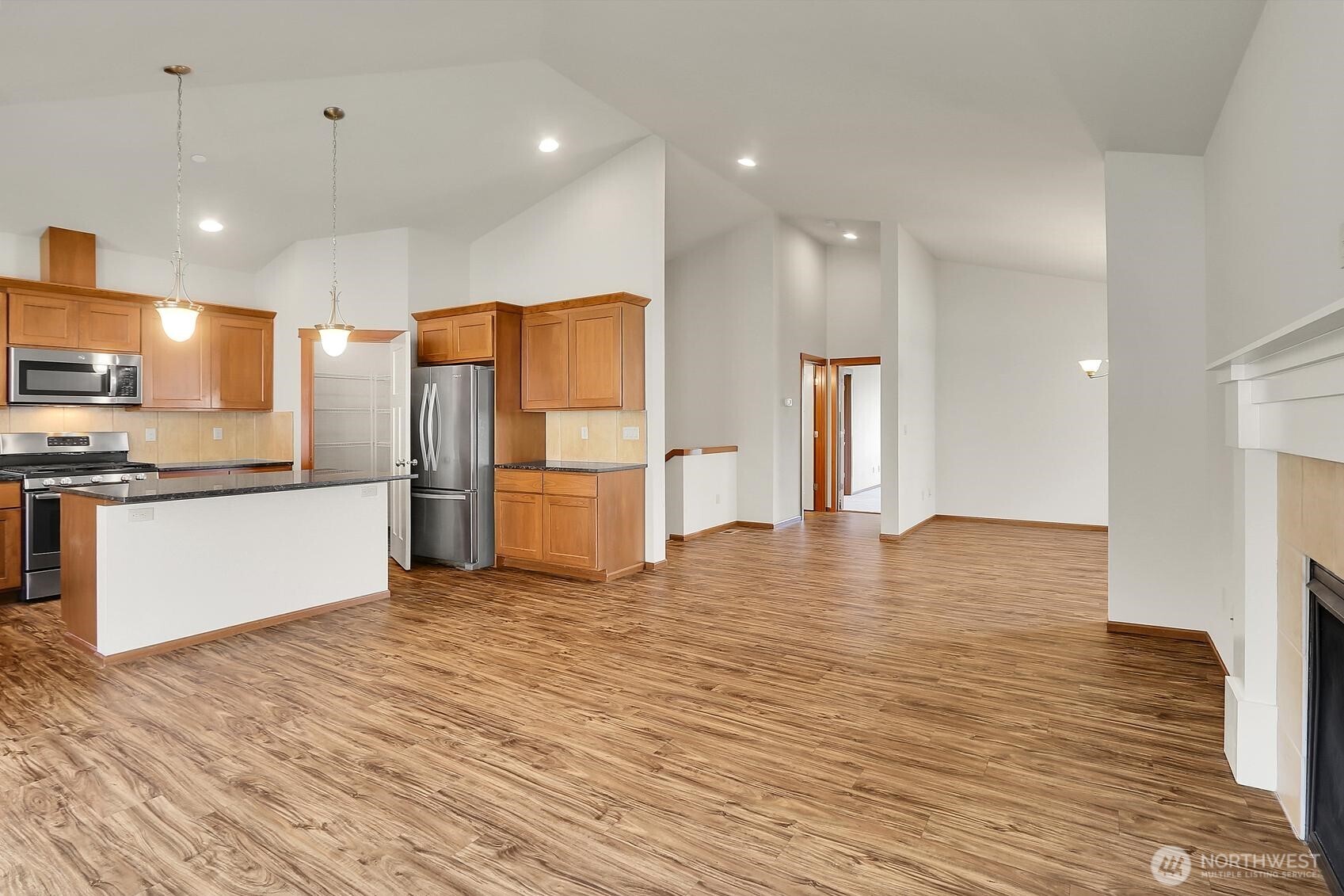 The outdoor space is right off the Great Room! No stairs to get out to BBQ!