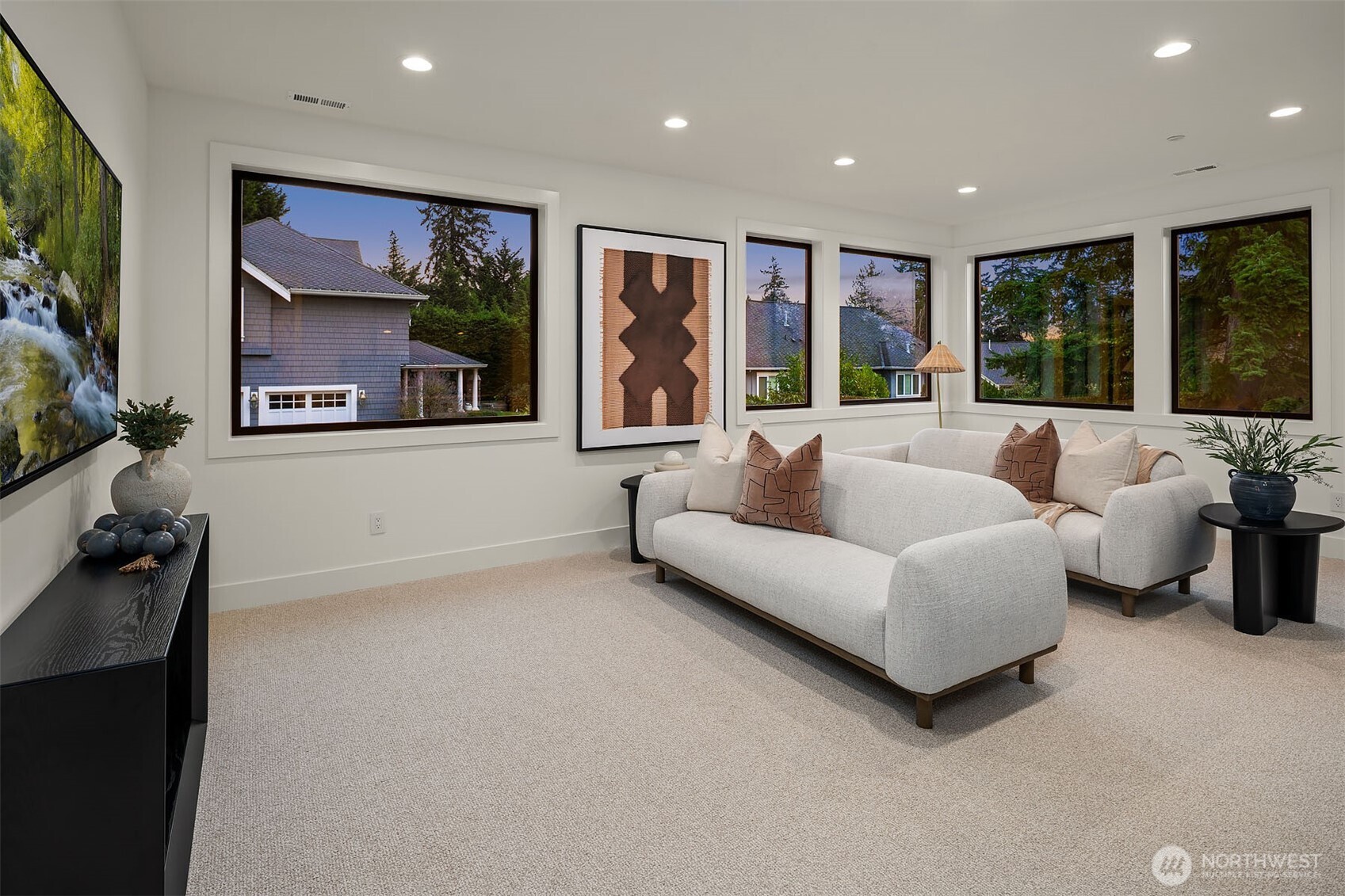 Flexible upper floor bonus space with theater room