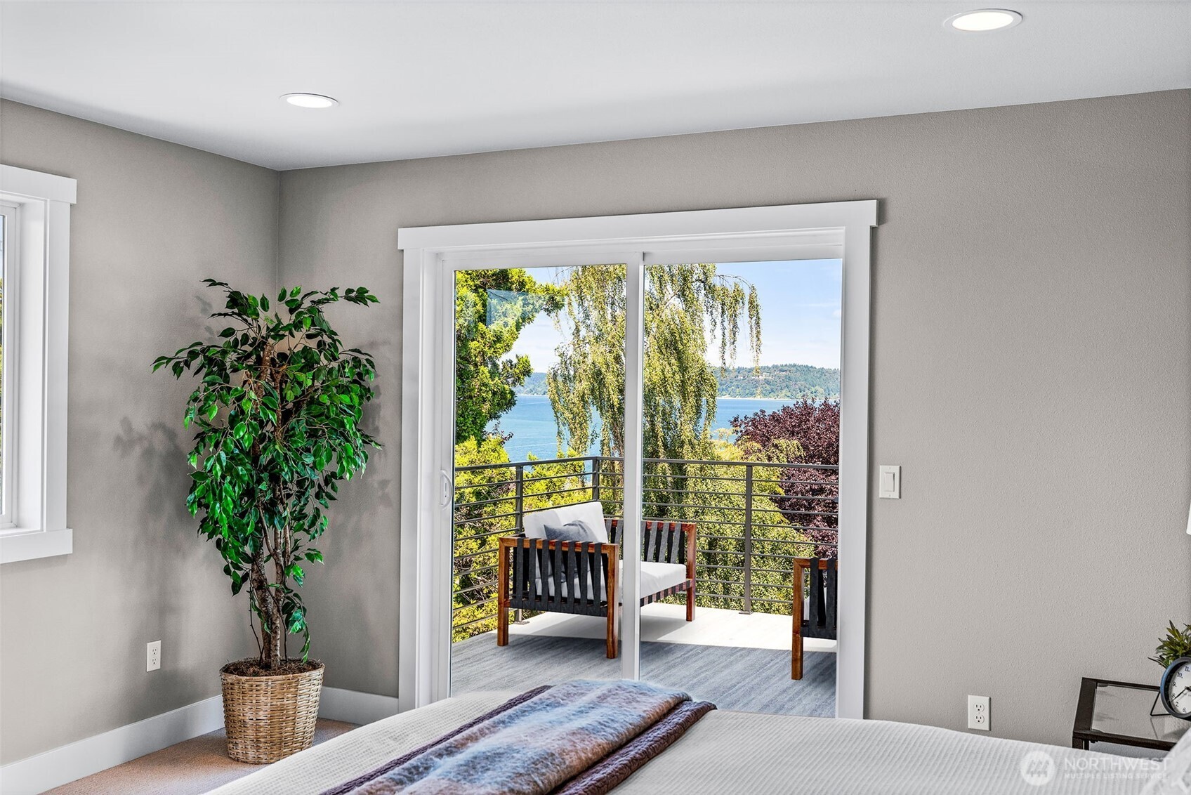 Your very own view deck off the Primary bedroom...the days area relaxing here and the sunsets are incredible.