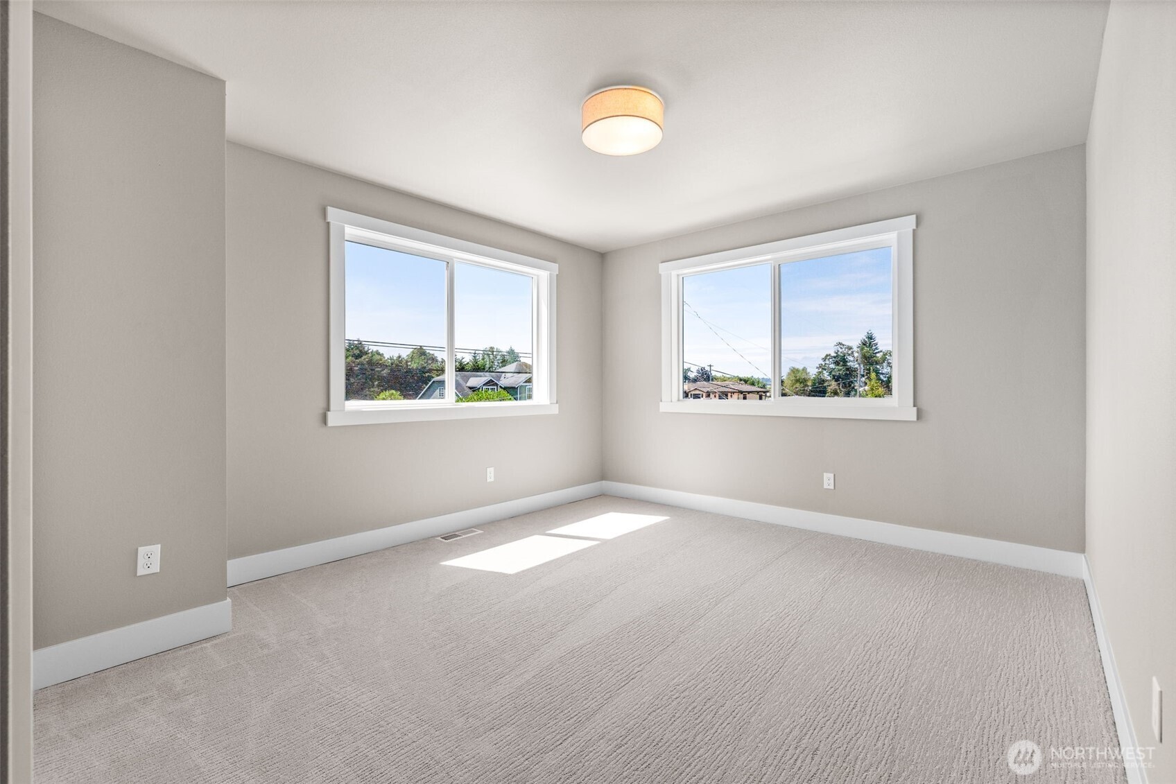 Additional bedrooms are generously sized and enjoy a partial view as well.