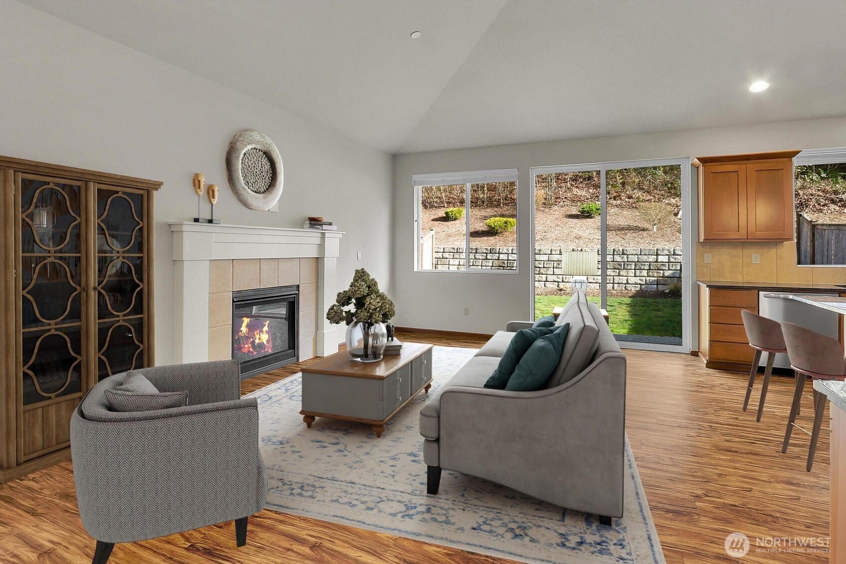 Cozy fireplace and lots of room to spread out in the Great Room. Virtually staged.