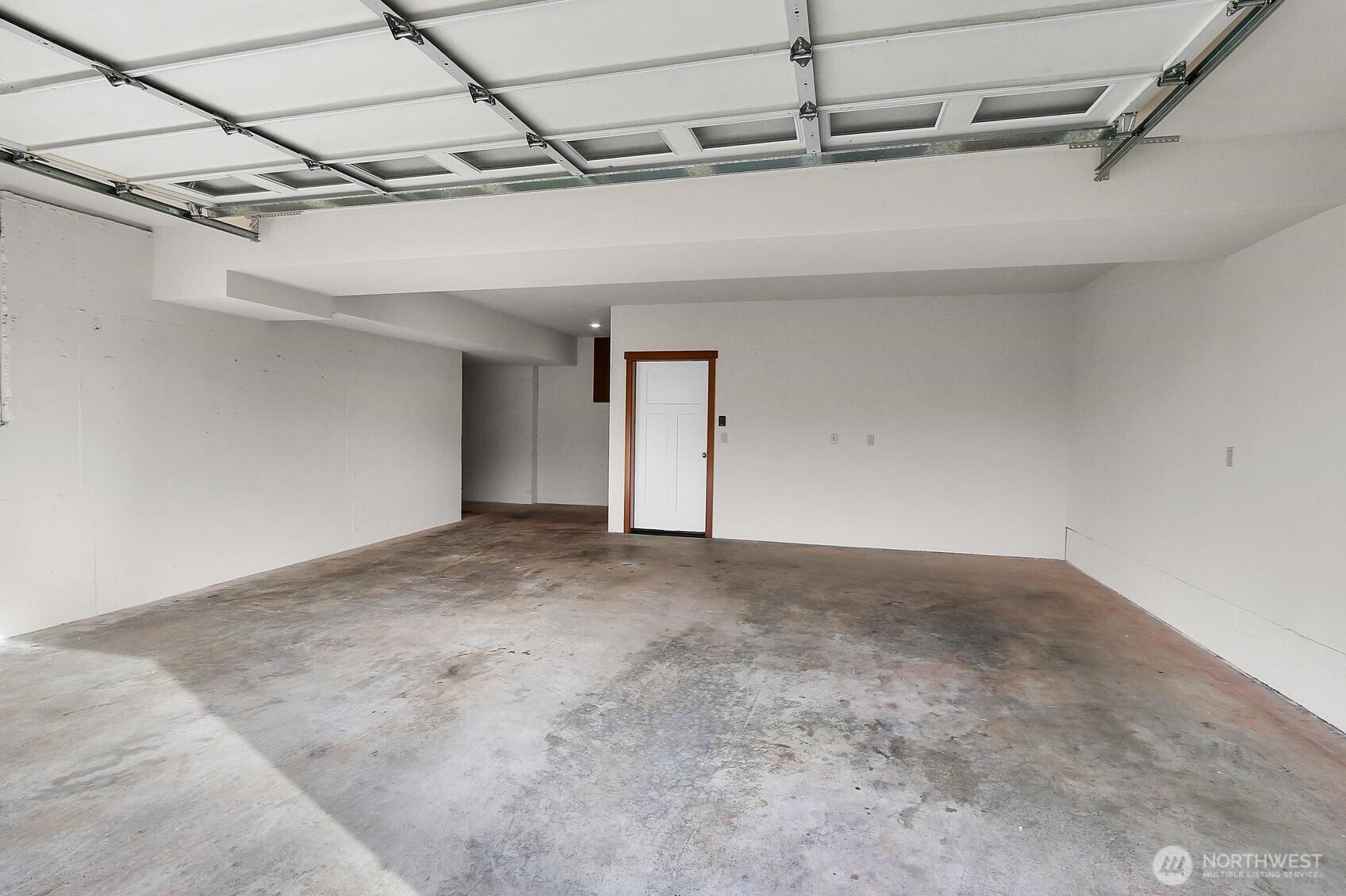 Oversized 2-car garage with tons additional storage area. It's the size of a 3-car garage!