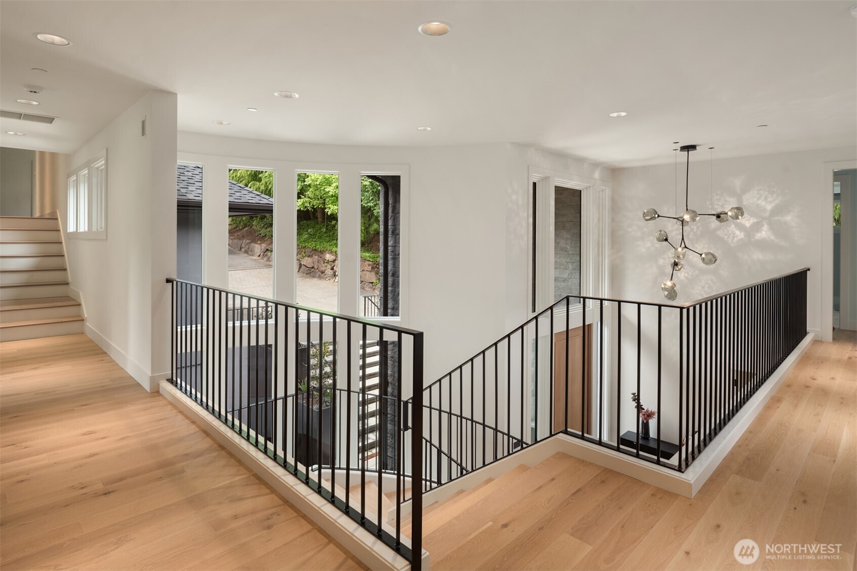 Guest suite & office on the main + 6 additional bedrooms including view primary w/spa-like bath.