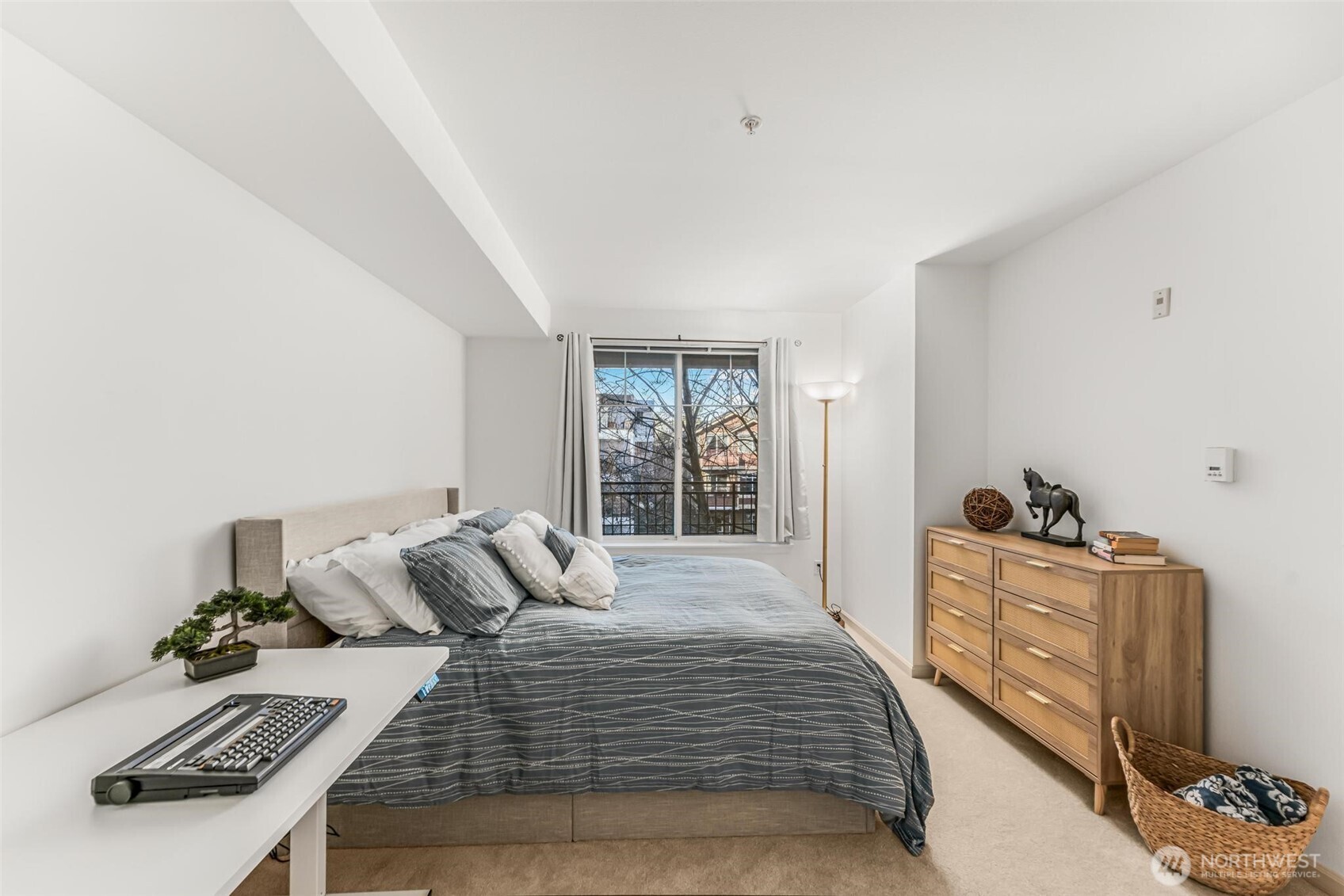 This bedroom can easily accommodate a King sized bed, dresser, and nightstands