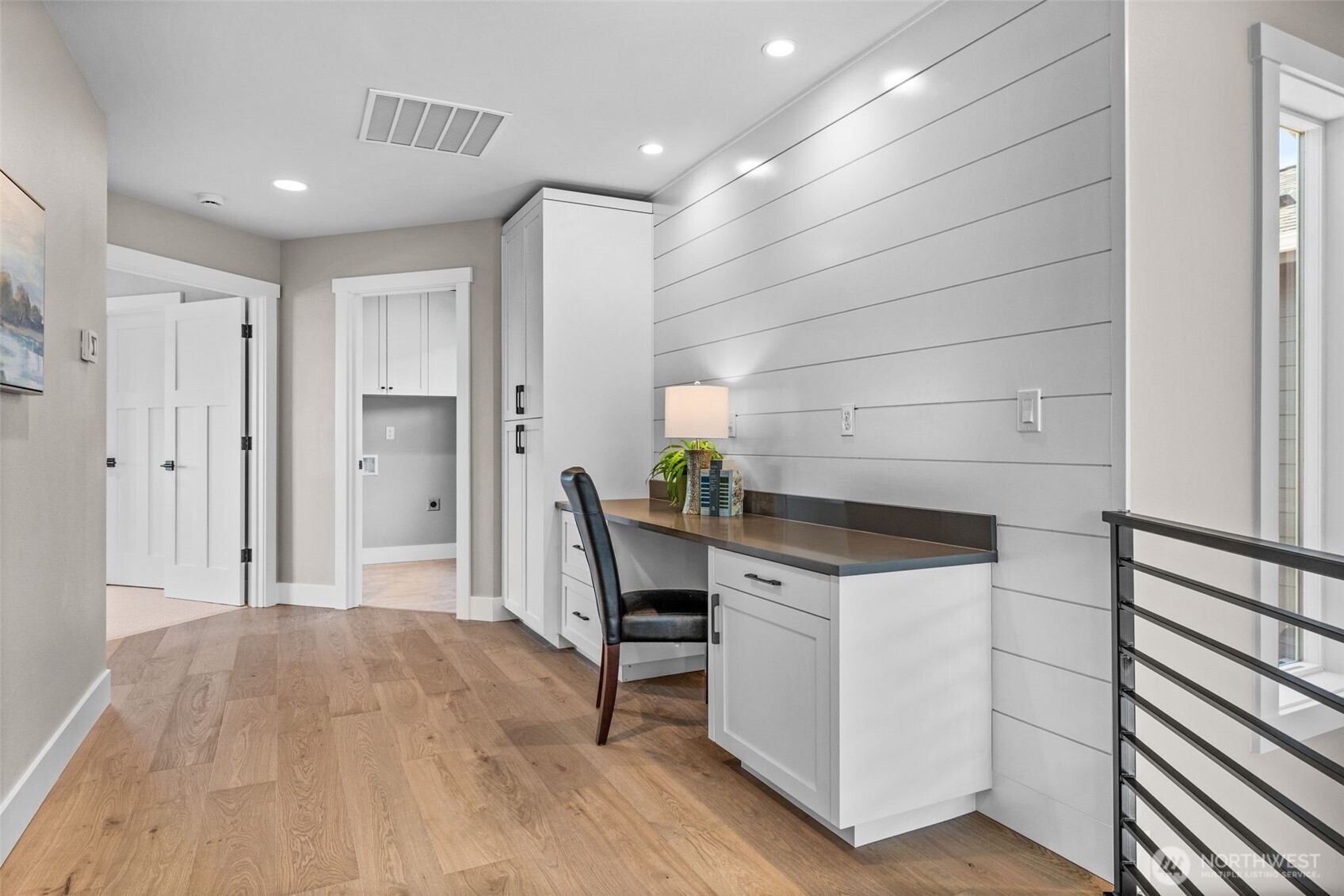 Custom built ins provide desk area & pantry style cabinetry for generous storage.