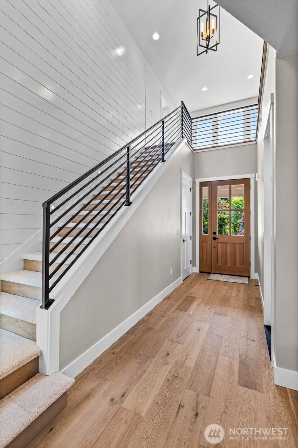 Open rail makes this space light & airy