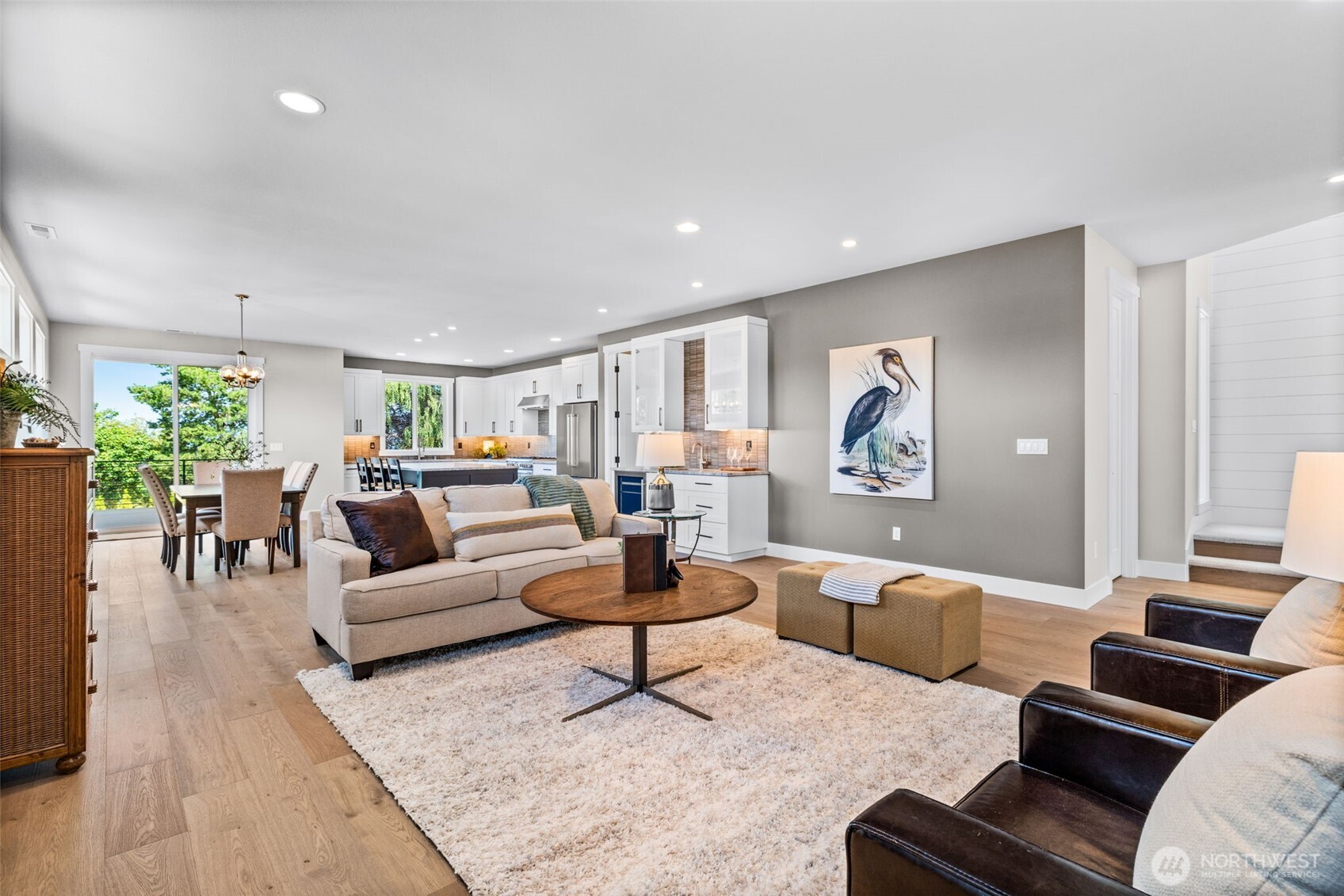 A 2nd view of the great room, looking back at the kitchen & dining area.