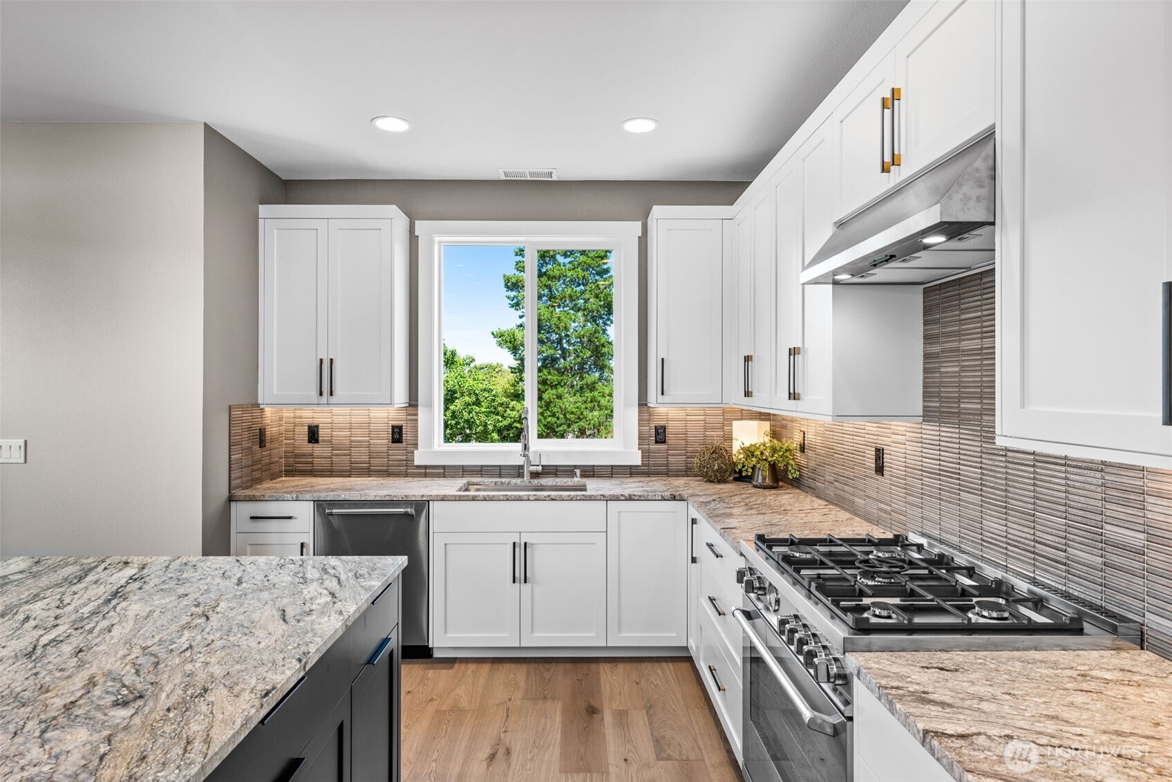 6 burner range is just one of the high end Bertazzoni appliances in this fabulous kitchen.