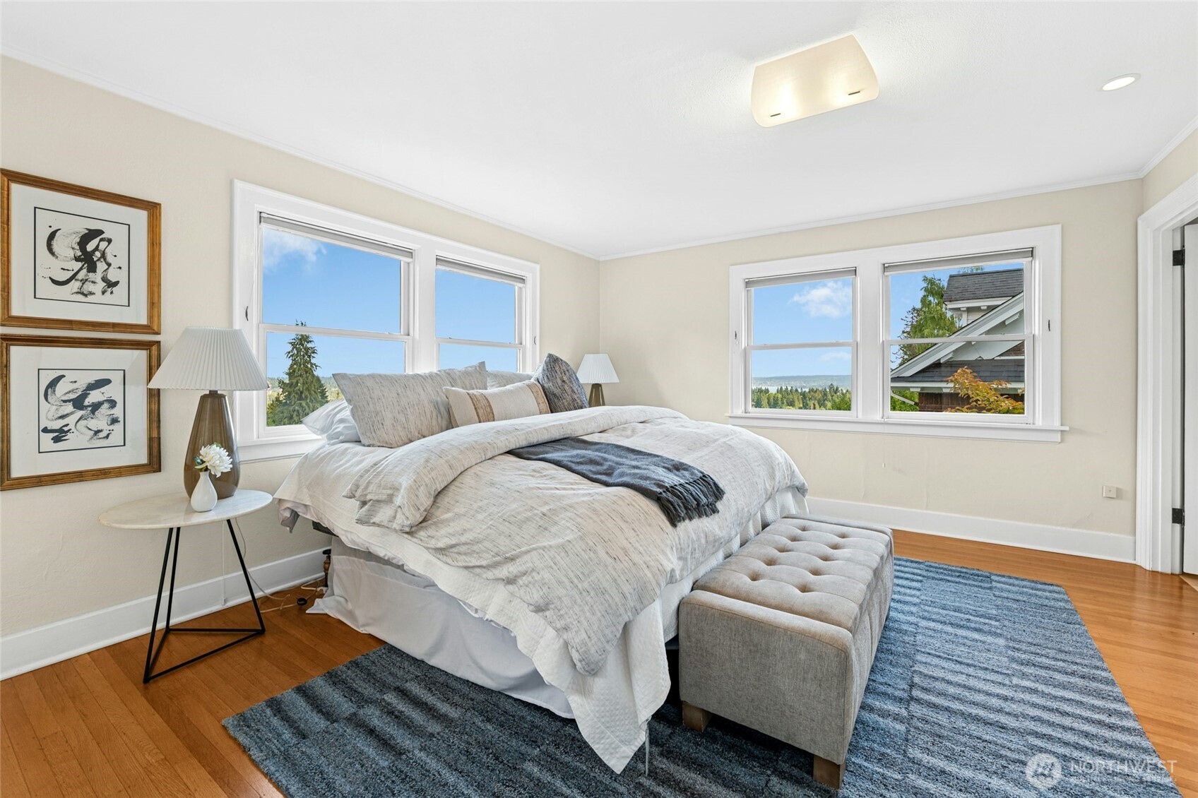 The primary suite has the best views in the house. Gently wake each morning to stunning sunrises over the Cascade mountains.