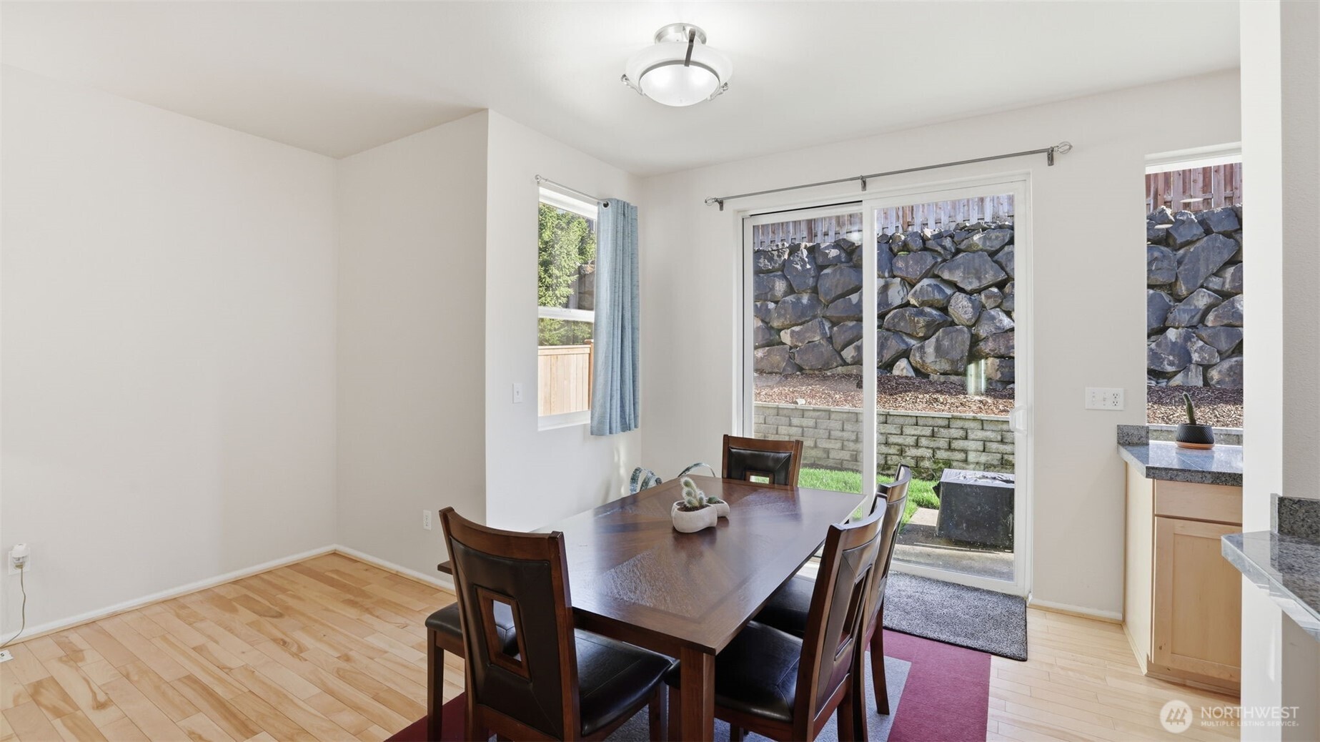 Enjoy everyday meals with natural light pouring in and easy access to the backyard.