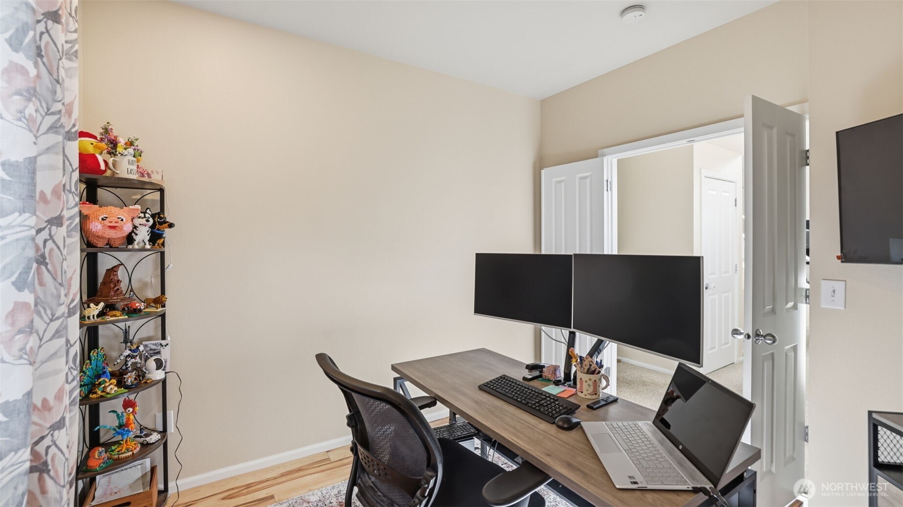 Lower level flex space ready to fit your lifestyle needs — ideal for work, projects, or a comfortable guest retreat.