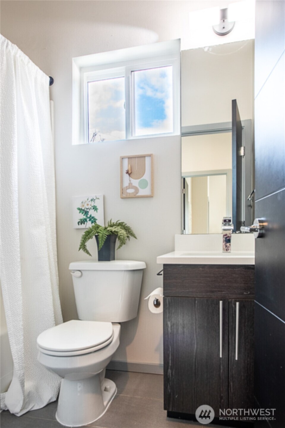 Another Full Bath located next to the 2nd Bedroom upstairs.