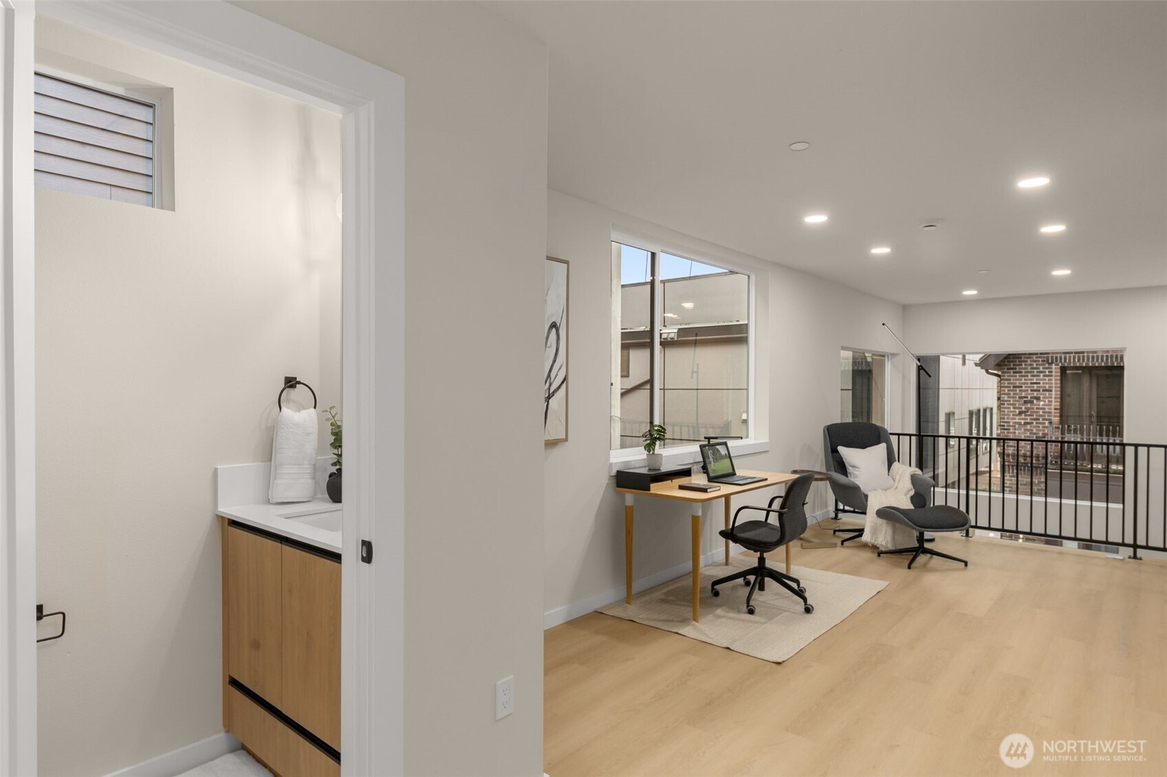 Tucked behind the office space, a half bath for convenience