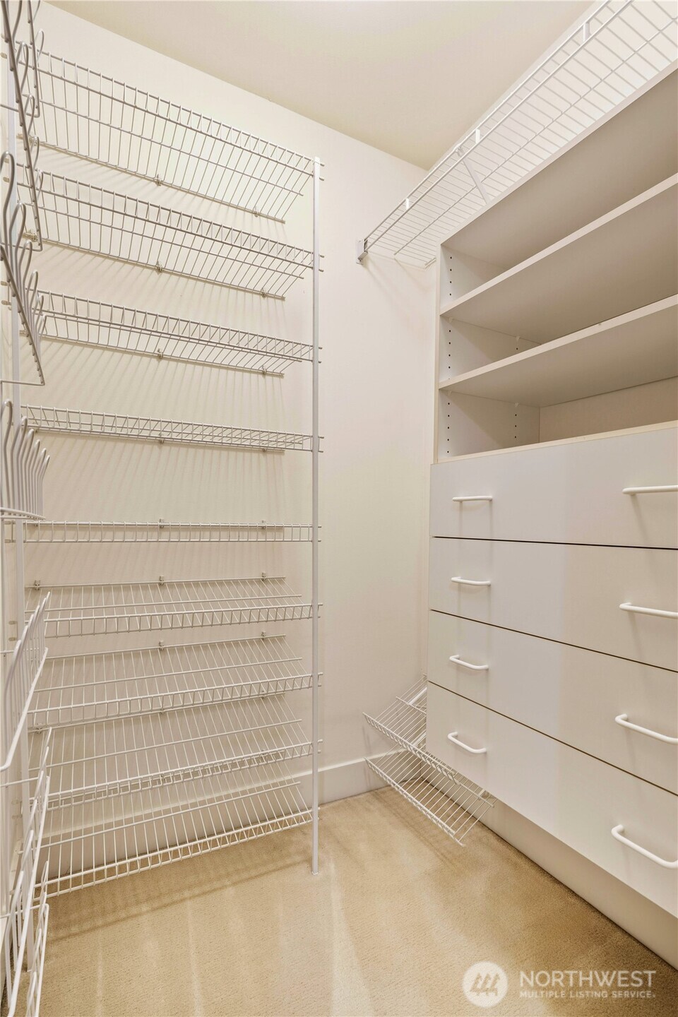 Upstairs bedroom has walk-in closet and storage flex space
