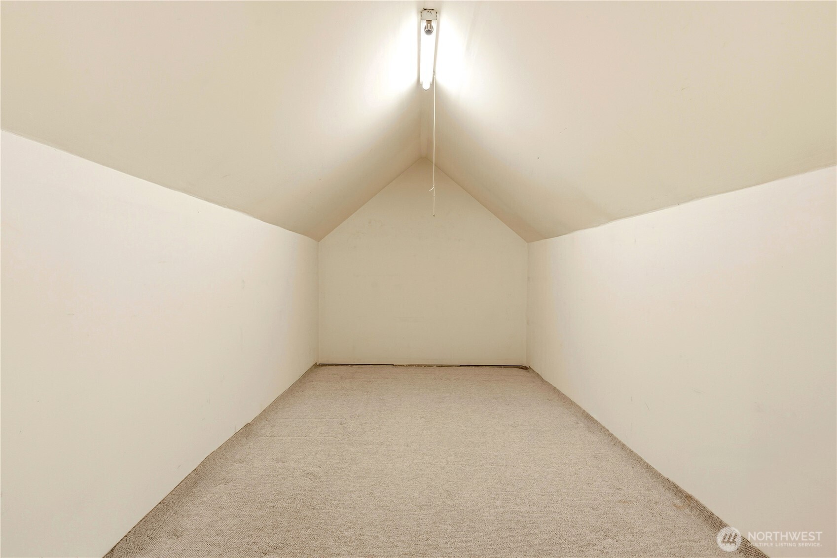 Upstairs bedroom has walk-in closet and storage flex space