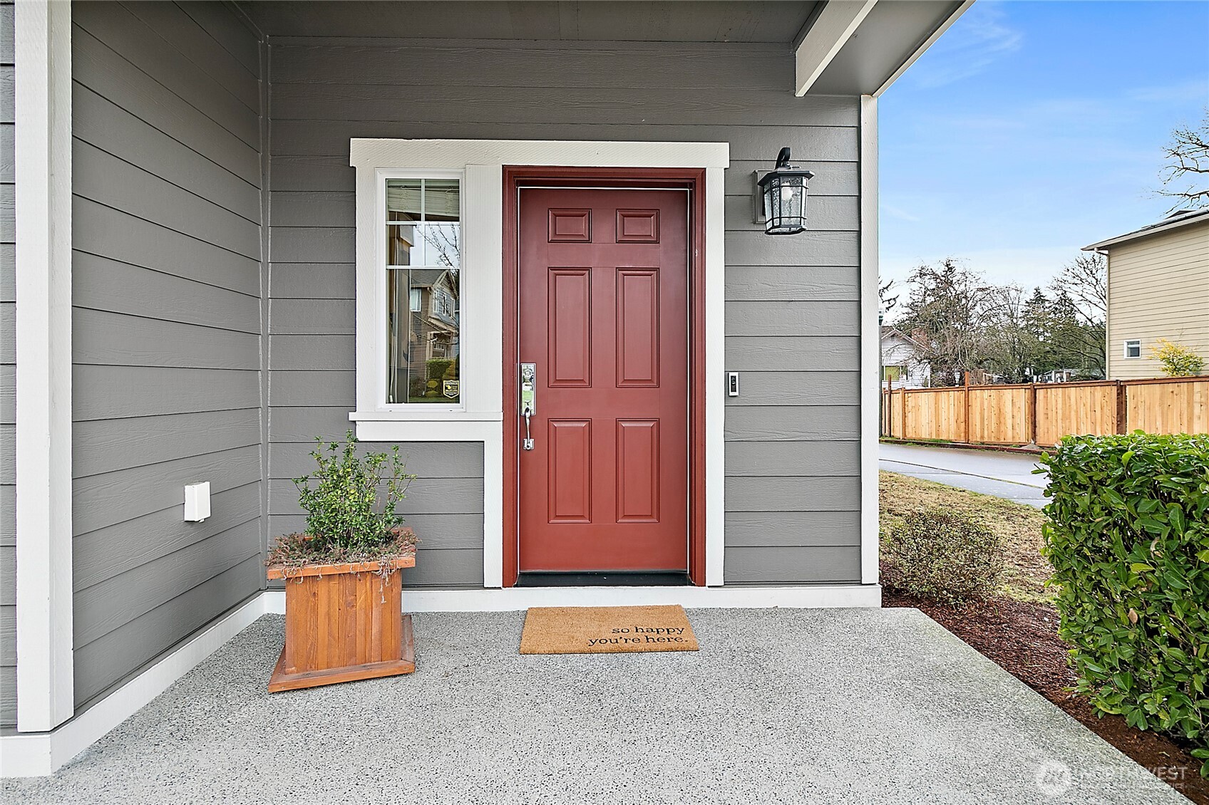 Front covered porch on corner lot.