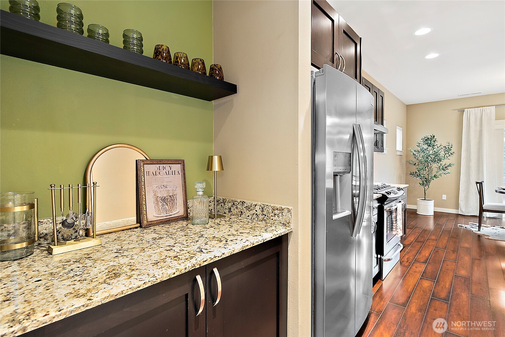 Kitchen includes a walk-in pantry, butlers' nook, and updated included appliances.