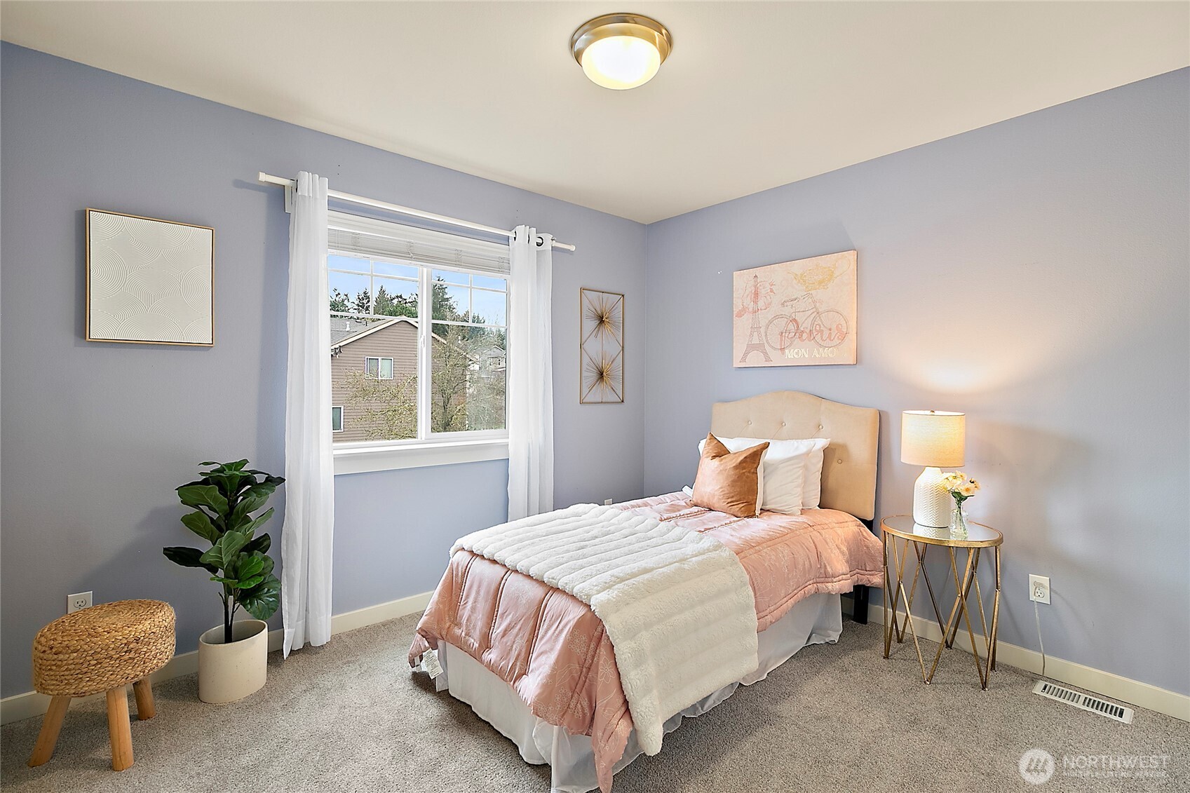 Light filled bedroom with welcoming atmosphere.