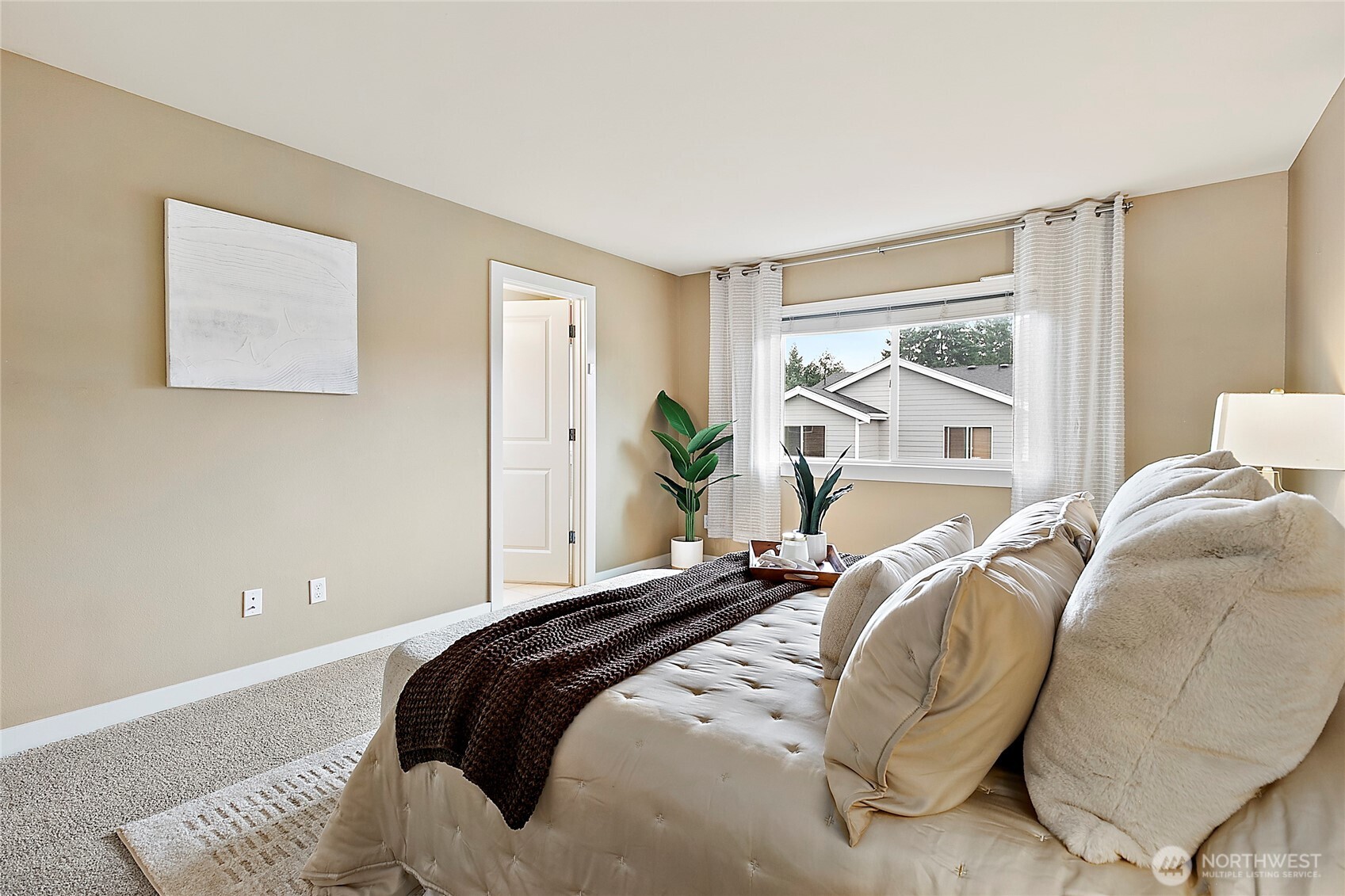 Hunter Douglas blinds throughout the home.