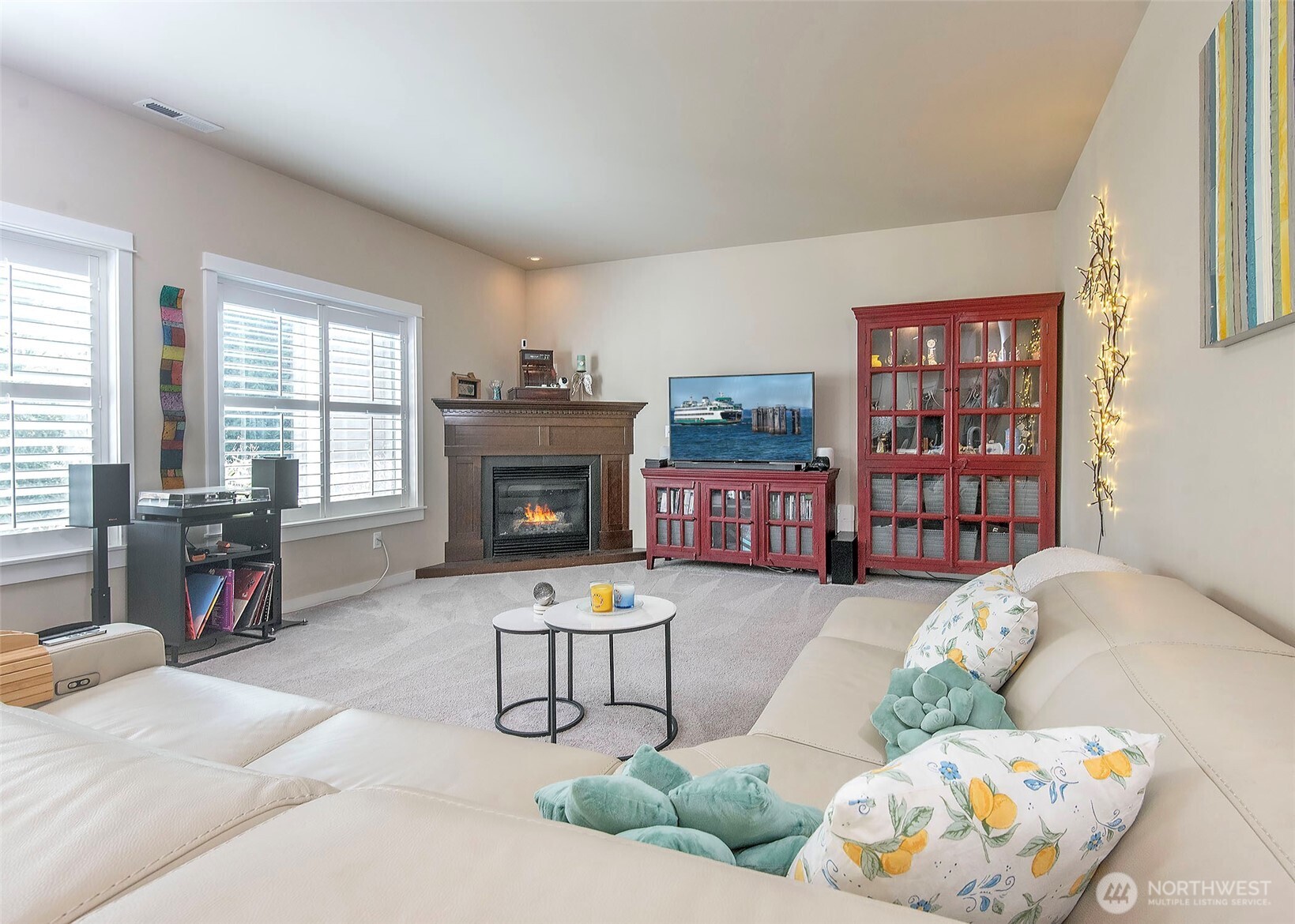 Custom plantation shutters add elegance and elevate the great room.