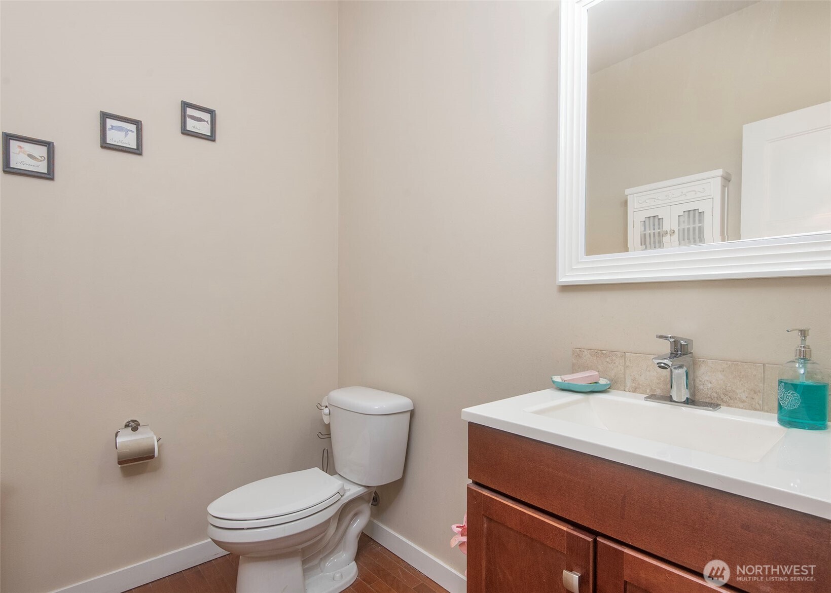 Spacious main floor powder room.