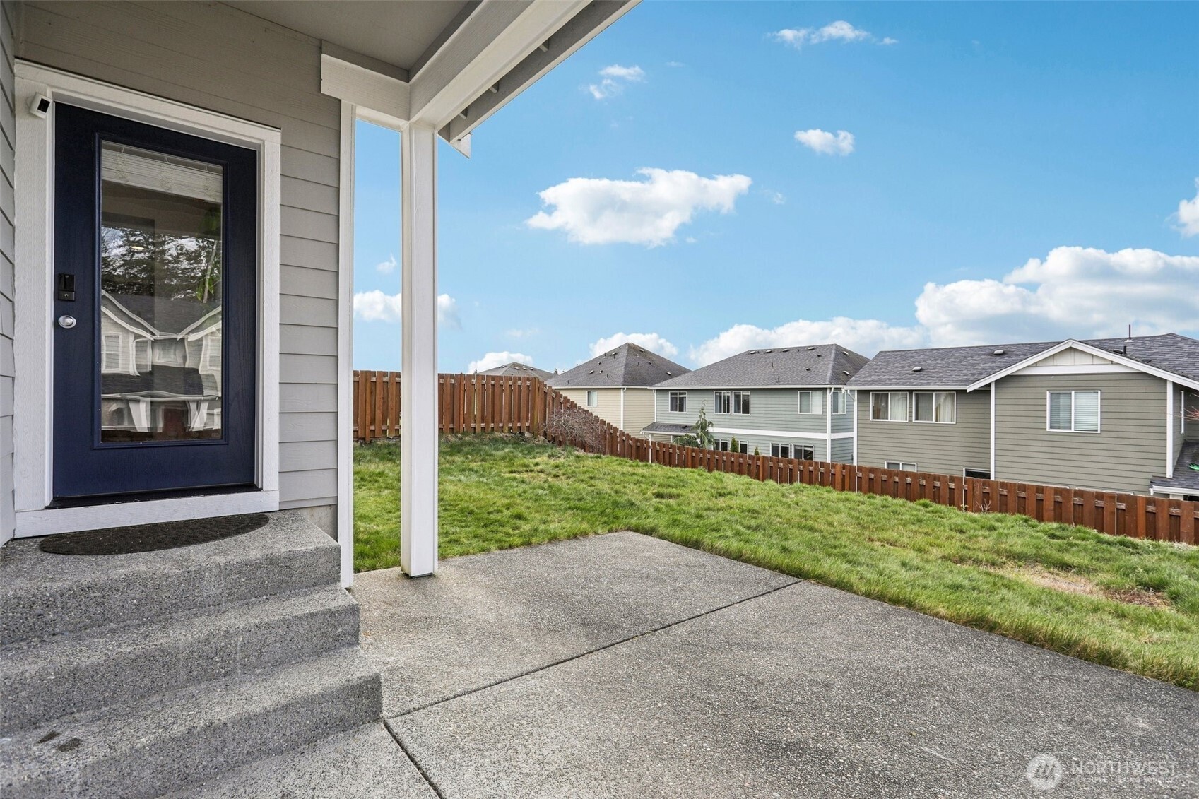 Covered back porch with territorial views