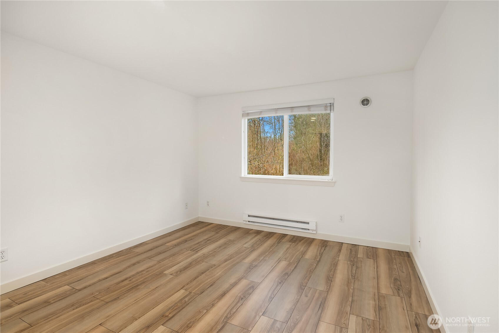 Entrance door leading to open concept living+dining area and connection to hallway that has bathroom positioned between two bedroom. Amazing floor plan!
