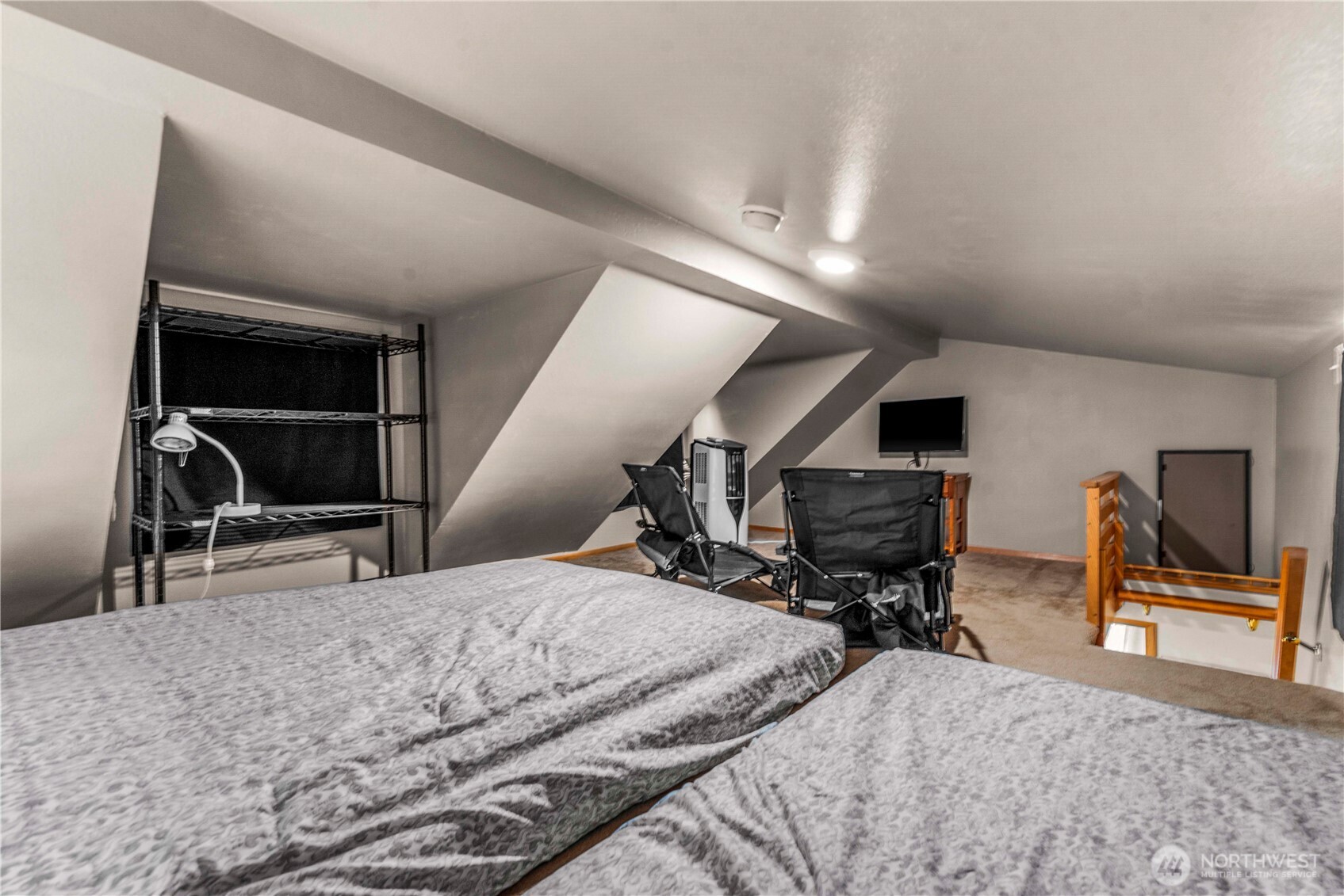 Additional sleeping in the loft, which has openable windows for cross-ventilation.