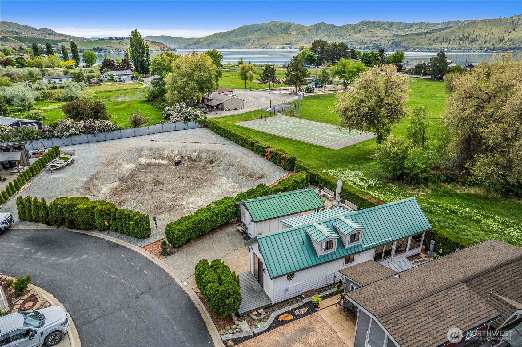 One of the best lots at VDL, there is plenty of outdoor living space at #33, and its location next to the retention pond means no neighbors on the east side.