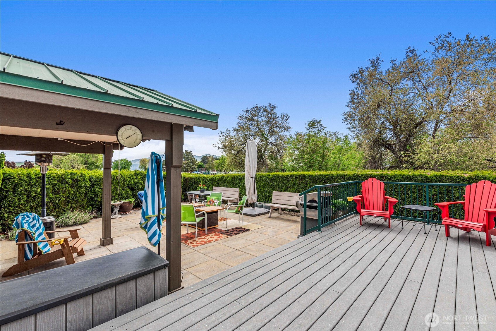 The big deck leading to the front door provides vistas in every direction. Let's step inside the home for a look...