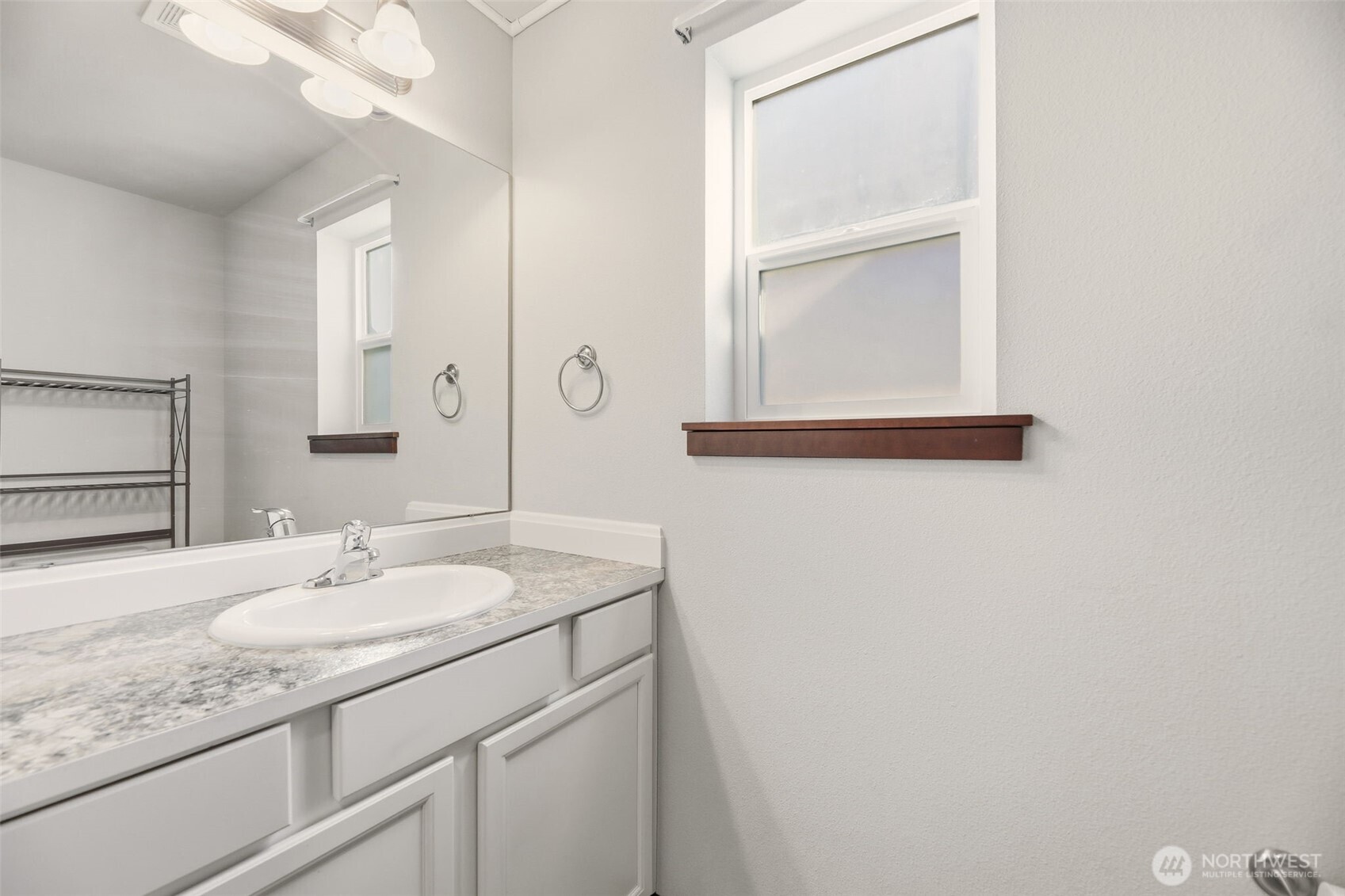 Bathroom next to Laundry Room